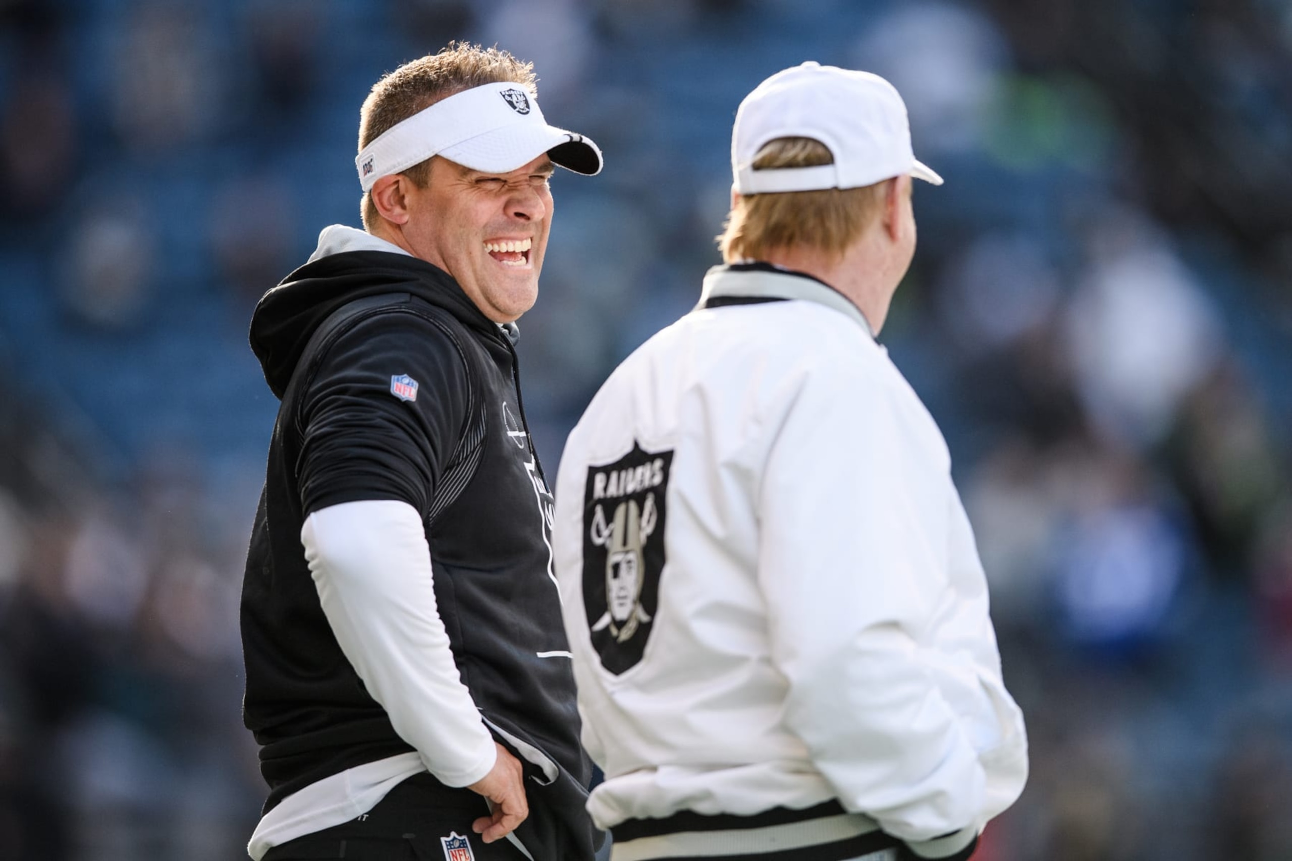 SEATTLE, WASHINGTON - NOVEMBER 27: Las Vegas Raiders head coach Josh McDaniels speaks with owner Mark Davis prior to the game against the Seattle Seahawks at Lumen Field on November 27, 2022 in Seattle, Washington. (Photo by Jane Gershovich/Getty Images)