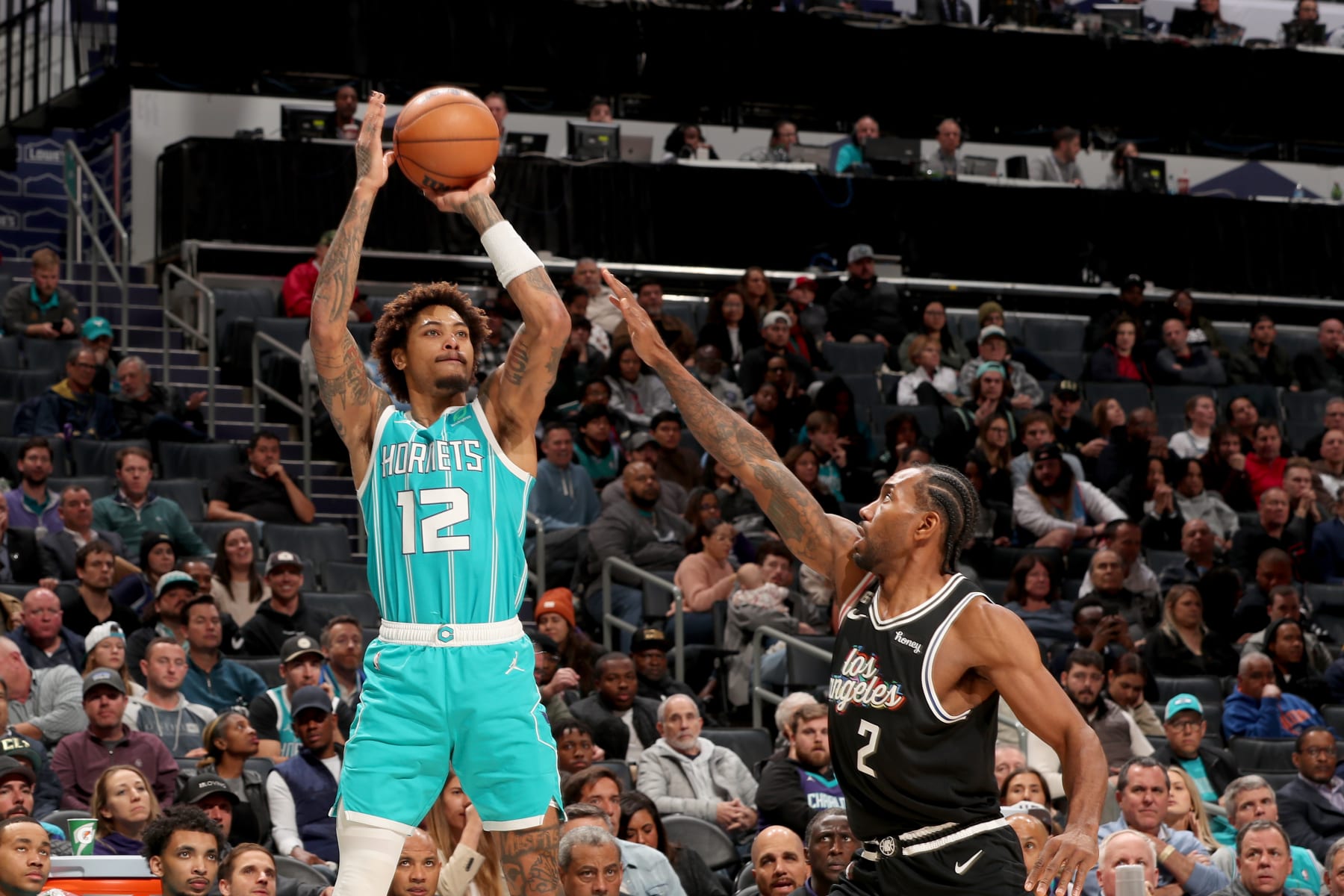 CHARLOTTE, NC - DECEMBER 5: Kelly Oubre Jr. #12 of the Charlotte Hornets shoots the ball during the game against the LA Clippers on December 5, 2022 at Spectrum Center in Charlotte, North Carolina. NOTE TO USER: User expressly acknowledges and agrees that, by downloading and or using this photograph, User is consenting to the terms and conditions of the Getty Images License Agreement. Mandatory Copyright Notice: Copyright 2022 NBAE (Photo by Kent Smith/NBAE via Getty Images)