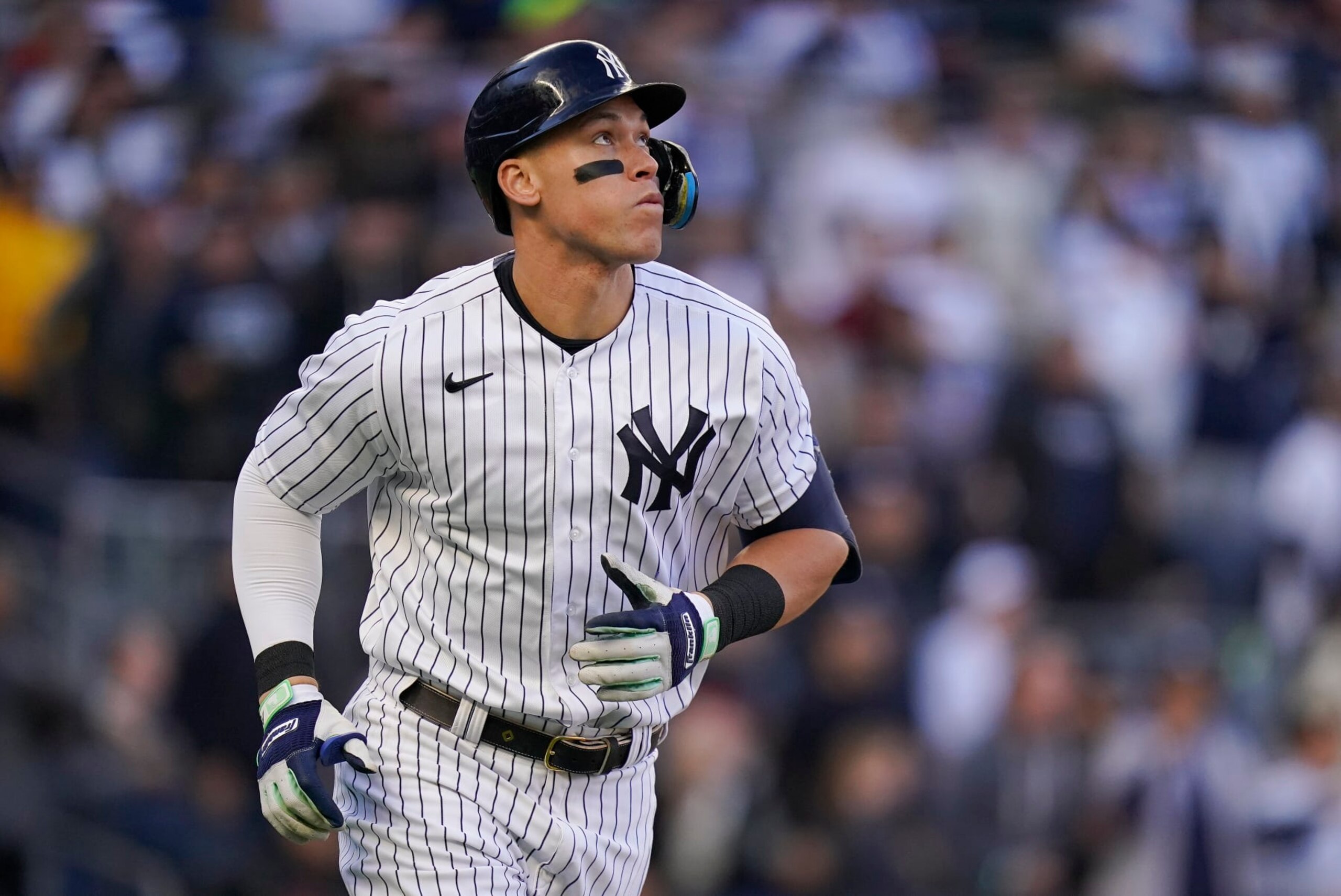New York Yankees center fielder Aaron Judge watches his solo home run ball during the second inning of Game 5 of an American League Division baseball series against the Cleveland Guardians, Tuesday, Oct. 18, 2022, in New York. (AP Photo/Frank Franklin II)
