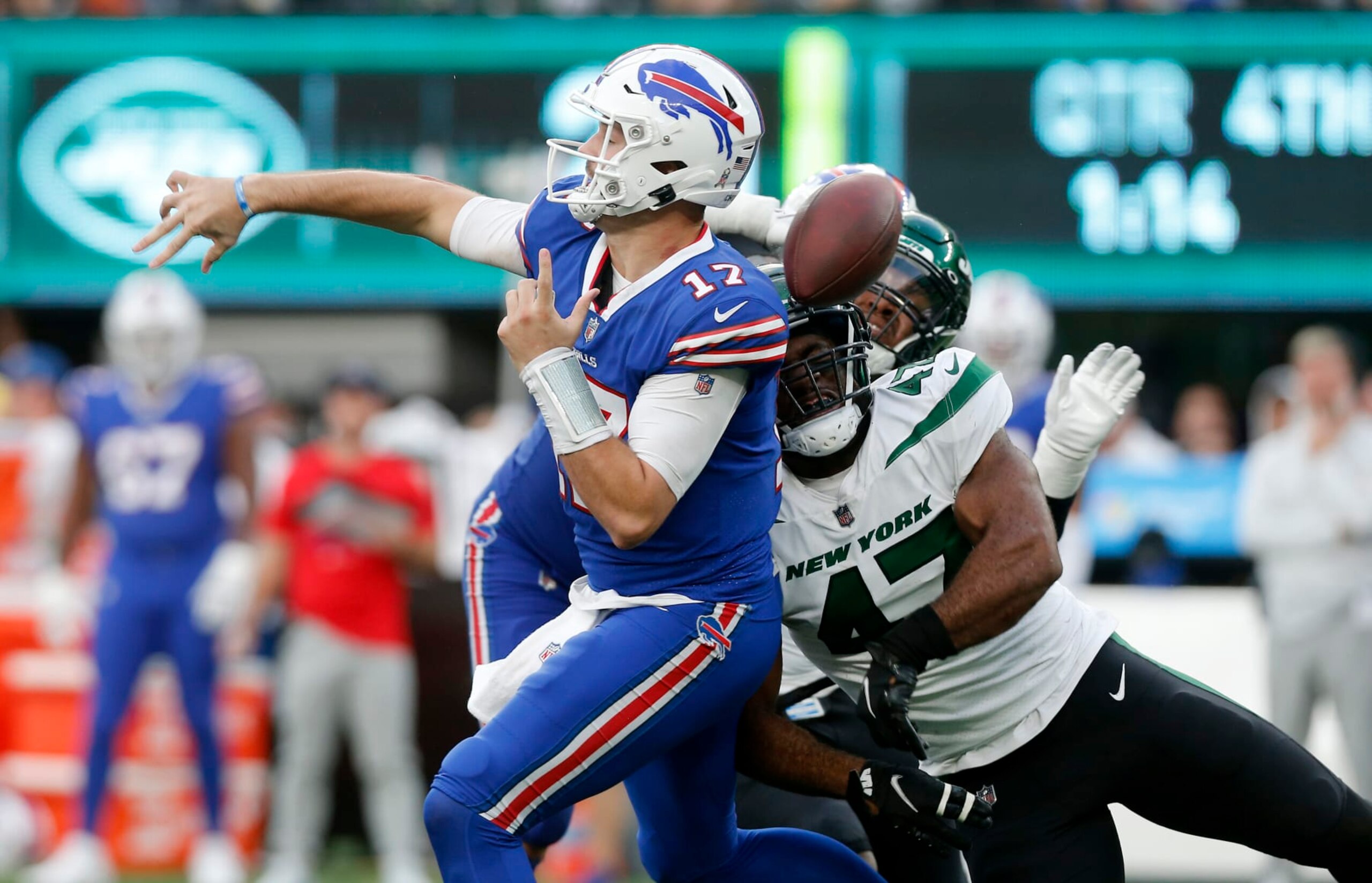 Bills QB Josh Allen and Jets DE Bryce Huff Bills QB Josh Allen and Jets DE Bryce Huff