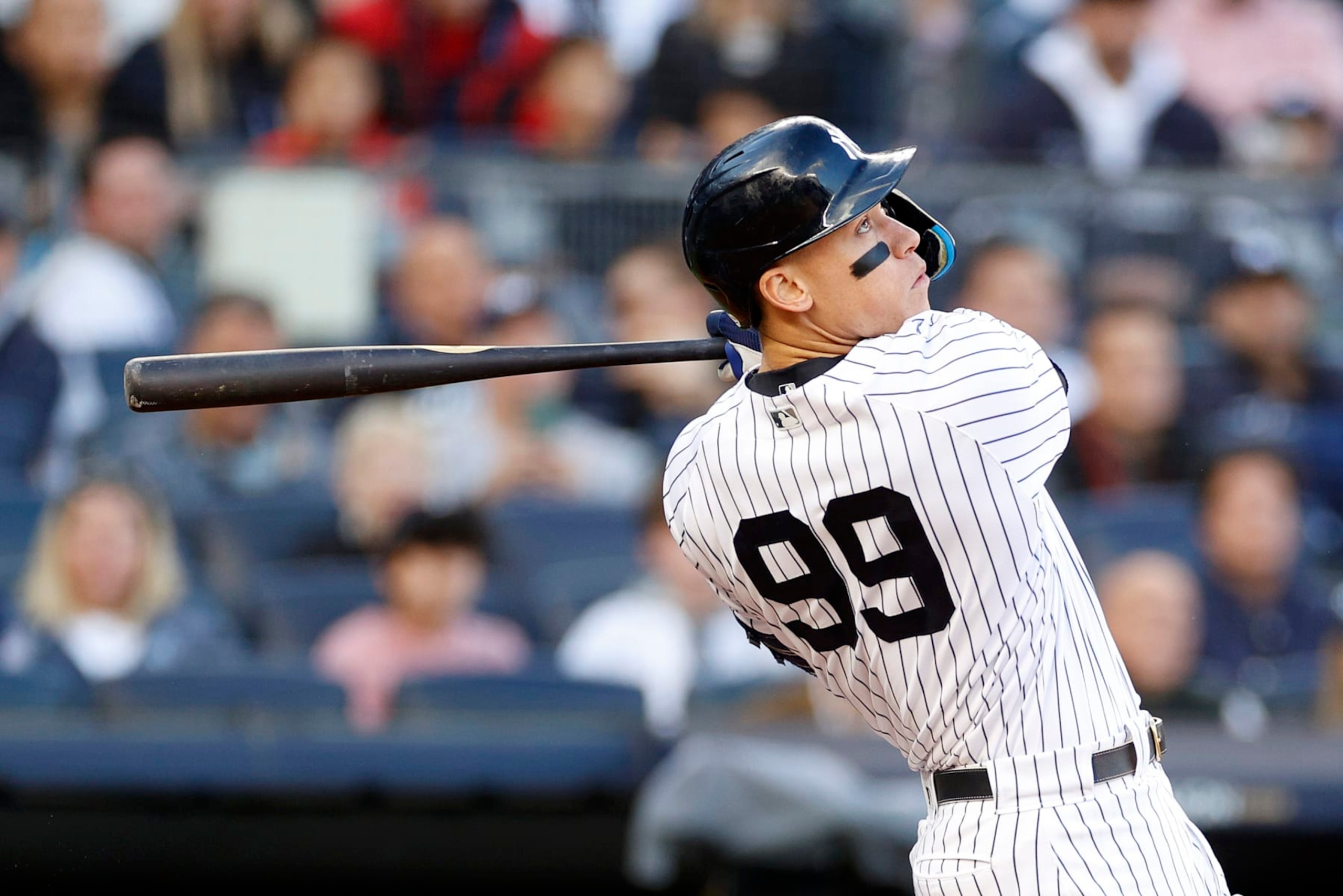 NEW YORK, NEW YORK - OCTOBER 18: Aaron Judge #99 of the New York Yankees hits a home run against the Cleveland Guardians during the second inning in game five of the American League Division Series at Yankee Stadium on October 18, 2022 in New York, New York. (Photo by Sarah Stier/Getty Images) NEW YORK, NEW YORK - OCTOBER 18: Aaron Judge #99 of the New York Yankees hits a home run against the Cleveland Guardians during the second inning in game five of the American League Division Series at Yankee Stadium on October 18, 2022 in New York, New York. (Photo by Sarah Stier/Getty Images)