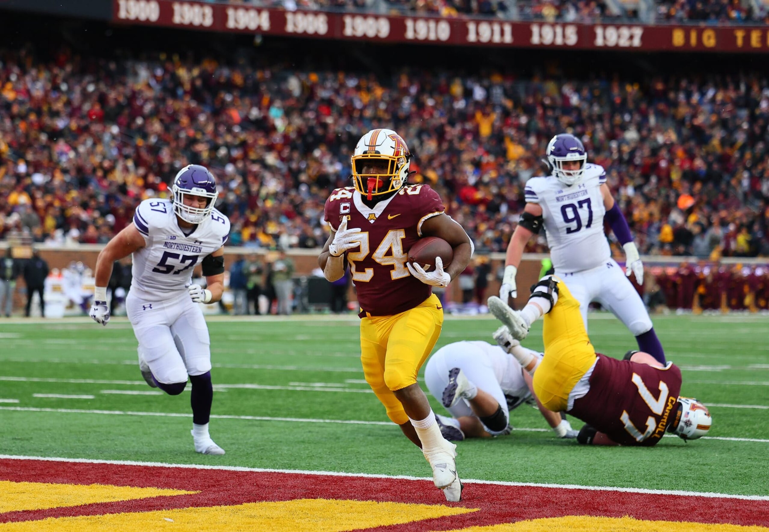 MINNEAPOLIS, MN - NOVEMBER 12: Mohamed Ibrahim #24 of the Minnesota Golden Gophers scores a touchdown against the Northwestern Wildcats in the first quarter on November 12, 2022 at Huntington Bank Stadium in Minneapolis, Minnesota. (Photo by Adam Bettcher/Getty Images) MINNEAPOLIS, MN - NOVEMBER 12: Mohamed Ibrahim #24 of the Minnesota Golden Gophers scores a touchdown against the Northwestern Wildcats in the first quarter on November 12, 2022 at Huntington Bank Stadium in Minneapolis, Minnesota. (Photo by Adam Bettcher/Getty Images)