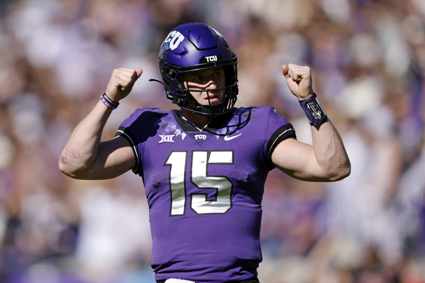 TCU quarterback Max Duggan (15) reacts after TCU made a first down against Texas Tech during the second half of an NCAA college football game Saturday, Nov. 5, 2022, in Fort Worth, Texas. (AP Photo/Ron Jenkins)