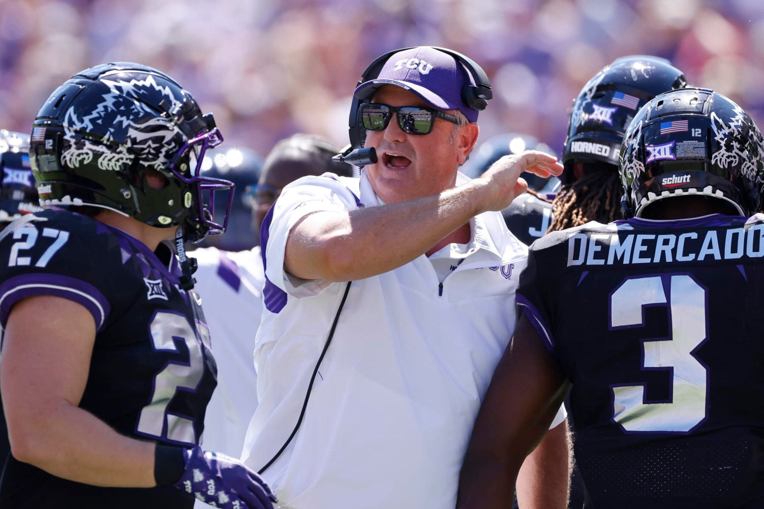 TCU head coach Sonny Dykes celebrates with his players after TCU scored a touchdown against Oklahoma during the first half of an NCAA college football game Saturday, Oct. 1, 2022, in Fort Worth, Texas. TCU won 55-24. (AP Photo/Ron Jenkins) TCU head coach Sonny Dykes celebrates with his players after TCU scored a touchdown against Oklahoma during the first half of an NCAA college football game Saturday, Oct. 1, 2022, in Fort Worth, Texas. TCU won 55-24. (AP Photo/Ron Jenkins)
