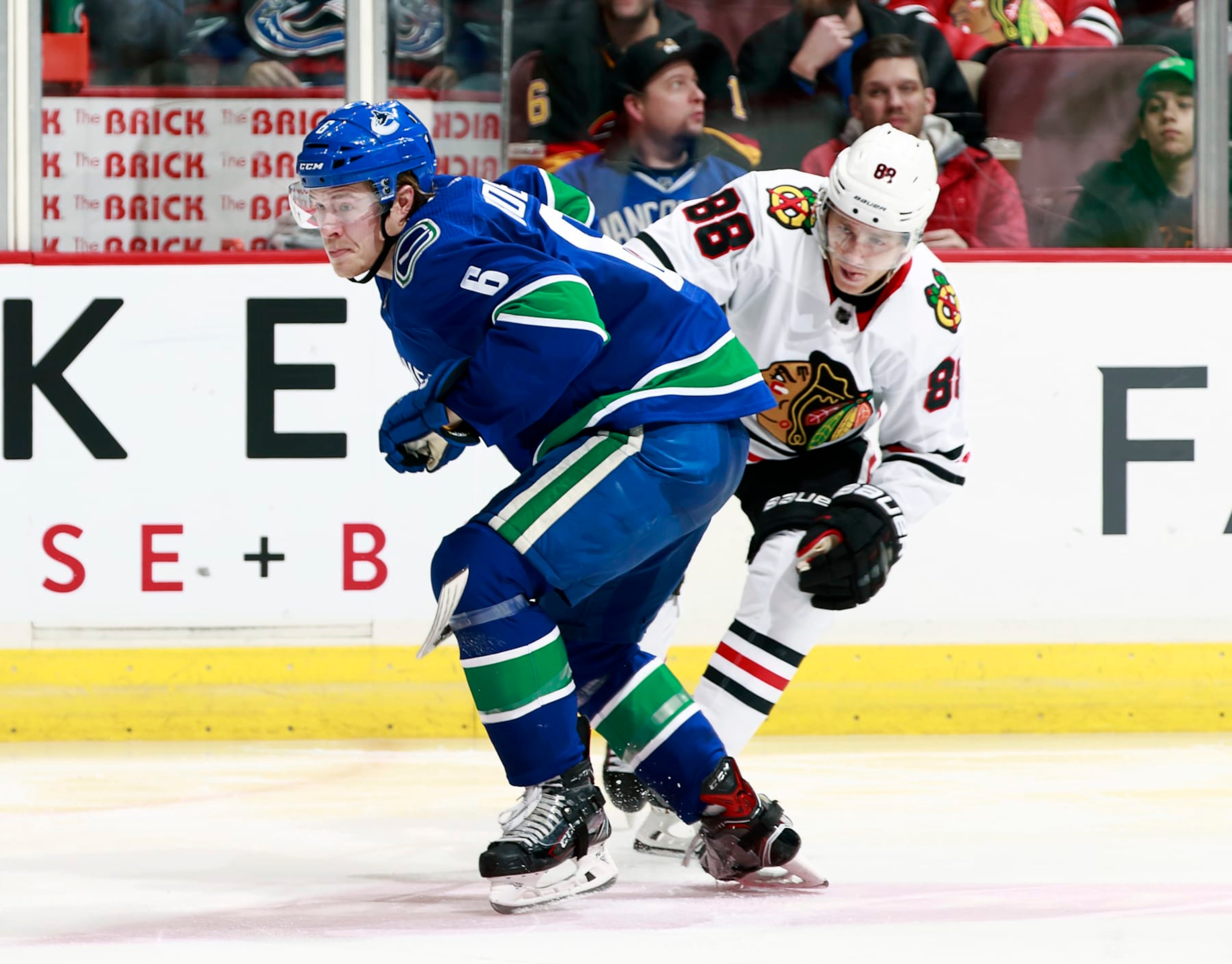 Vancouver Canucks winger Brock Boeser and Chicago Blackhawks winger Patrick Kane.