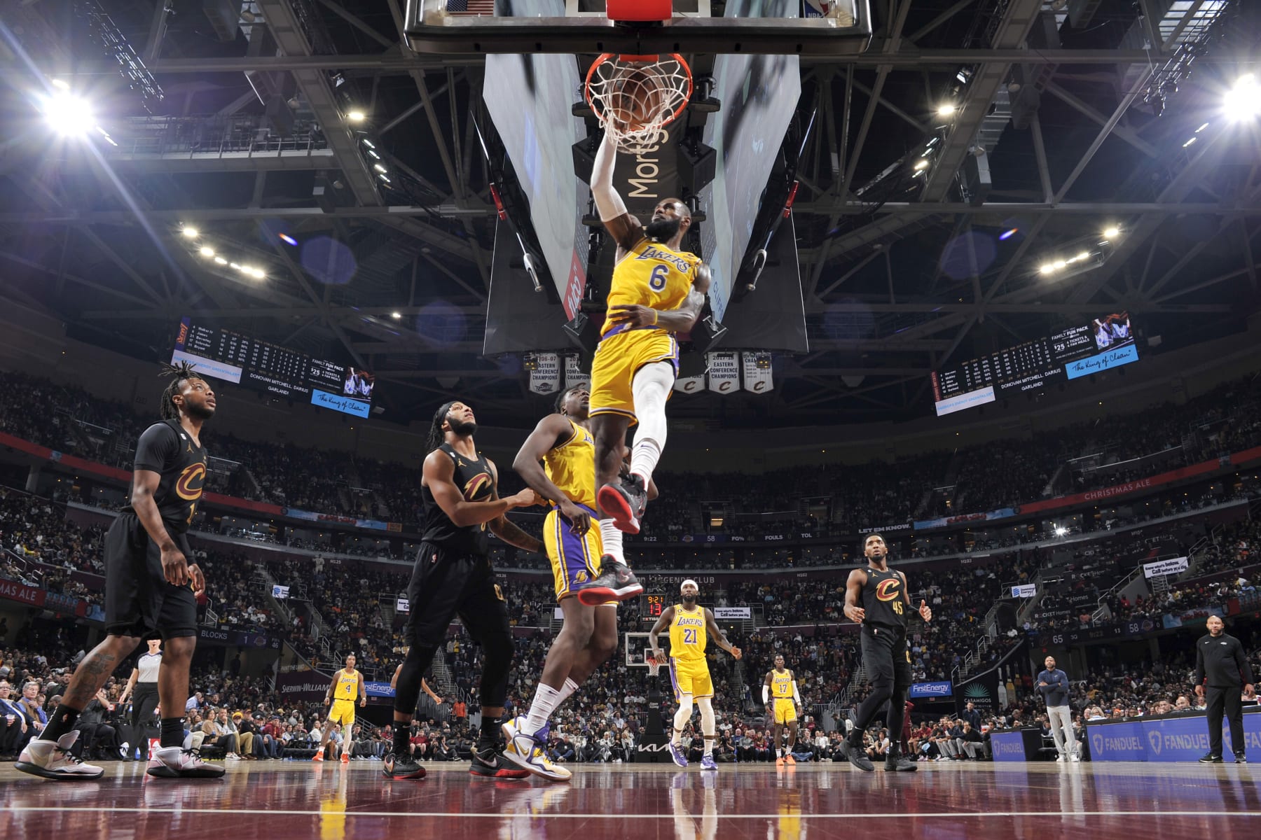 CLEVELAND, OH - DECEMBER 6: LeBron James #6 of the Los Angeles Lakers dunks the ball during the game against the Cleveland Cavaliers on December 6, 2022 at Rocket Mortgage FieldHouse in Cleveland, Ohio. NOTE TO USER: User expressly acknowledges and agrees that, by downloading and/or using this Photograph, user is consenting to the terms and conditions of the Getty Images License Agreement. Mandatory Copyright Notice: Copyright 2022 NBAE (Photo by David Liam Kyle/NBAE via Getty Images)