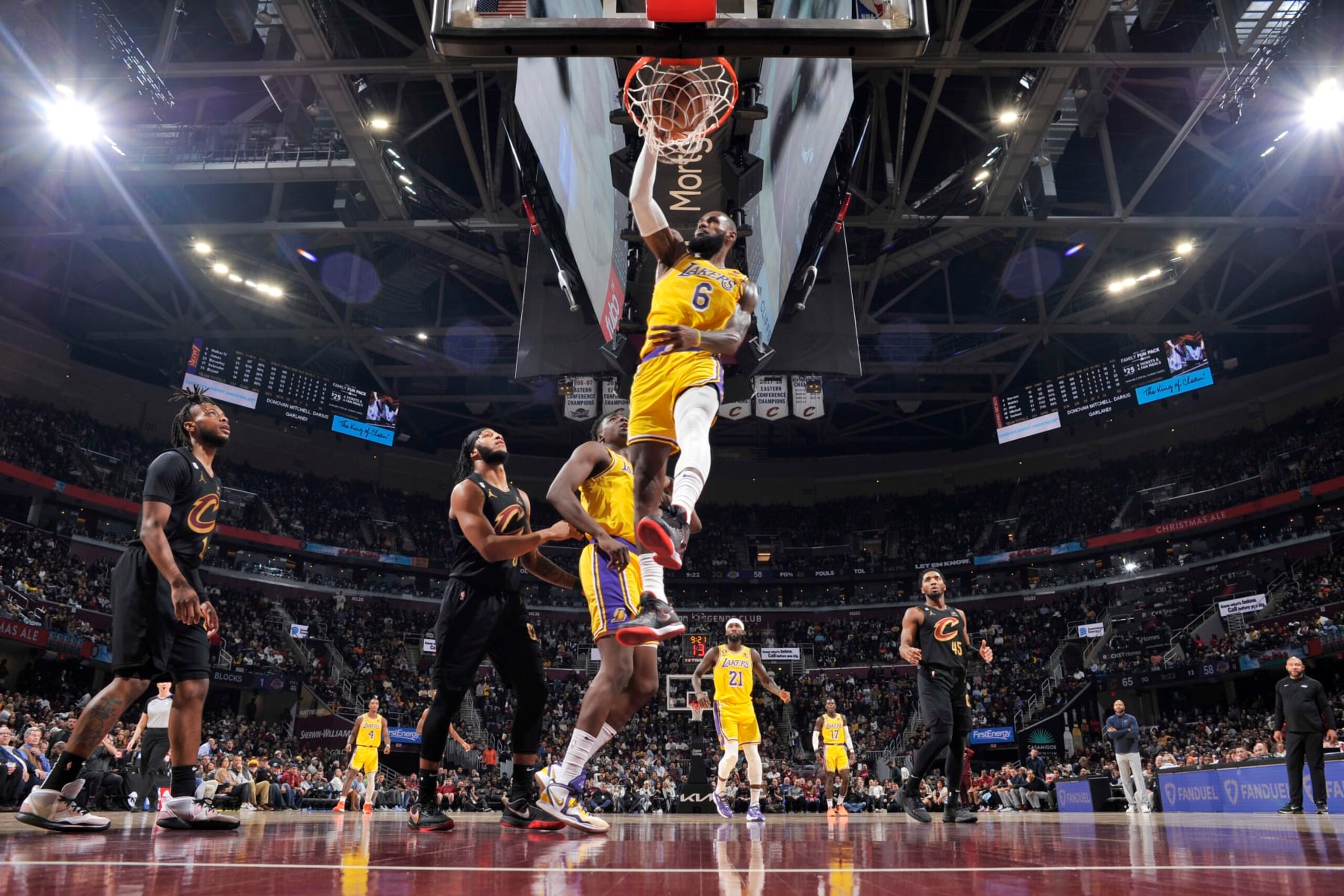 CLEVELAND, OH - DECEMBER 6: LeBron James #6 of the Los Angeles Lakers dunks the ball during the game against the Cleveland Cavaliers on December 6, 2022 at Rocket Mortgage FieldHouse in Cleveland, Ohio. NOTE TO USER: User expressly acknowledges and agrees that, by downloading and/or using this Photograph, user is consenting to the terms and conditions of the Getty Images License Agreement. Mandatory Copyright Notice: Copyright 2022 NBAE (Photo by David Liam Kyle/NBAE via Getty Images)