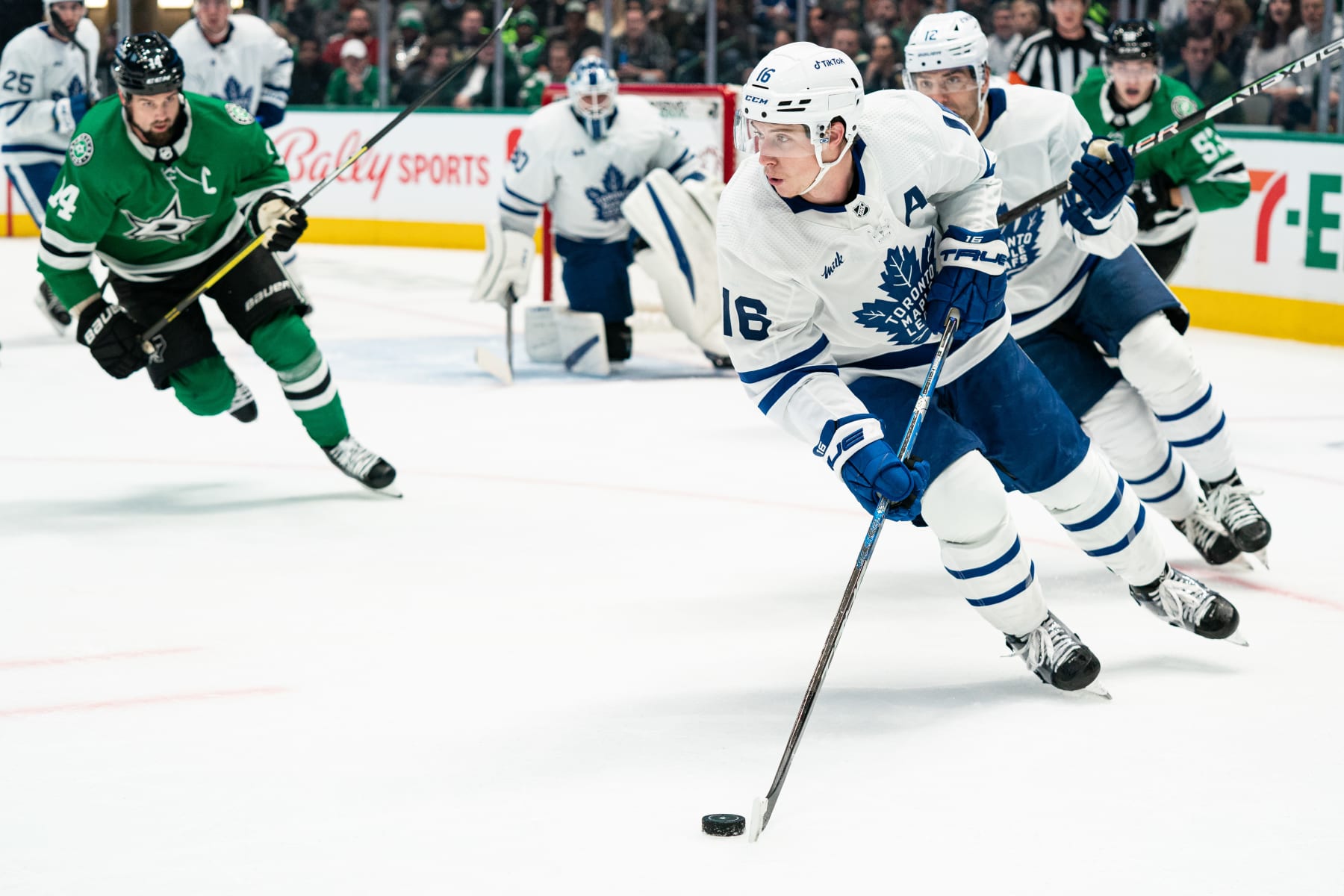DALLAS, TEXAS - DECEMBER 06: Mitchell Marner #16 of the Toronto Maple Leafs skates with the puck during the first period against the Dallas Stars at American Airlines Center on December 06, 2022 in Dallas, Texas. (Photo by Sam Hodde/NHLI via Getty Images)