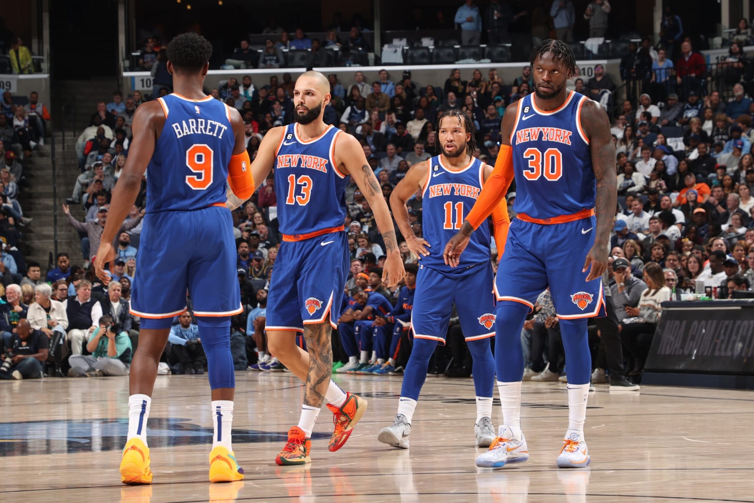 MEMPHIS, TN - OCTOBER 19: Evan Fournier #13, Jalen Brunson #11, Julius Randle #30 and RJ Barrett #9 of the New York Knicks look on during the game against the Memphis Grizzlies on October 19, 2022 at FedExForum in Memphis, Tennessee. NOTE TO USER: User expressly acknowledges and agrees that, by downloading and or using this photograph, User is consenting to the terms and conditions of the Getty Images License Agreement. Mandatory Copyright Notice: Copyright 2022 NBAE (Photo by Joe Murphy/NBAE via Getty Images)
