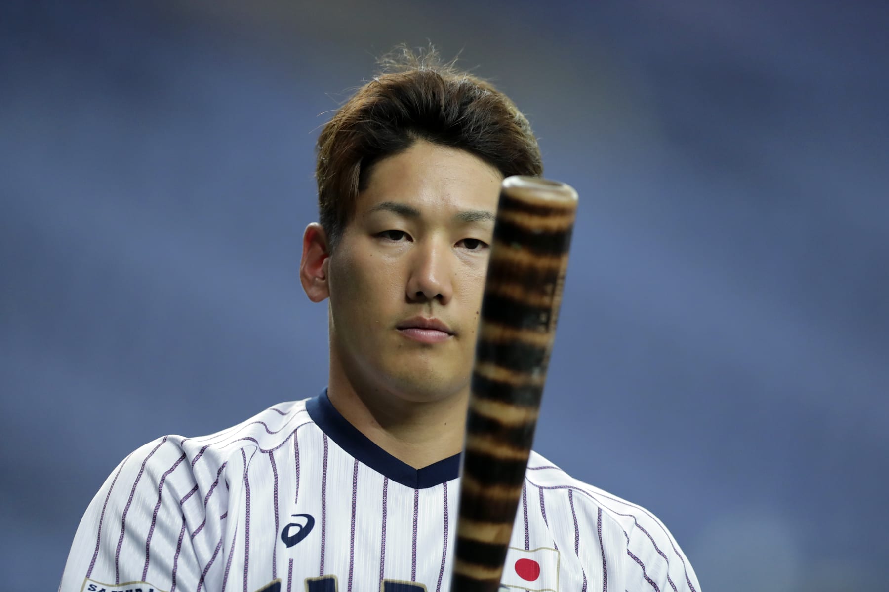 OSAKA, JAPAN - MARCH 10: Outfielder Masataka Yoshida #34 of Japan warms up prior to the game two between Japan and Mexico at Kyocera Dome Osaka on March 10, 2019 in Osaka, Japan. (Photo by Kiyoshi Ota/Getty Images)