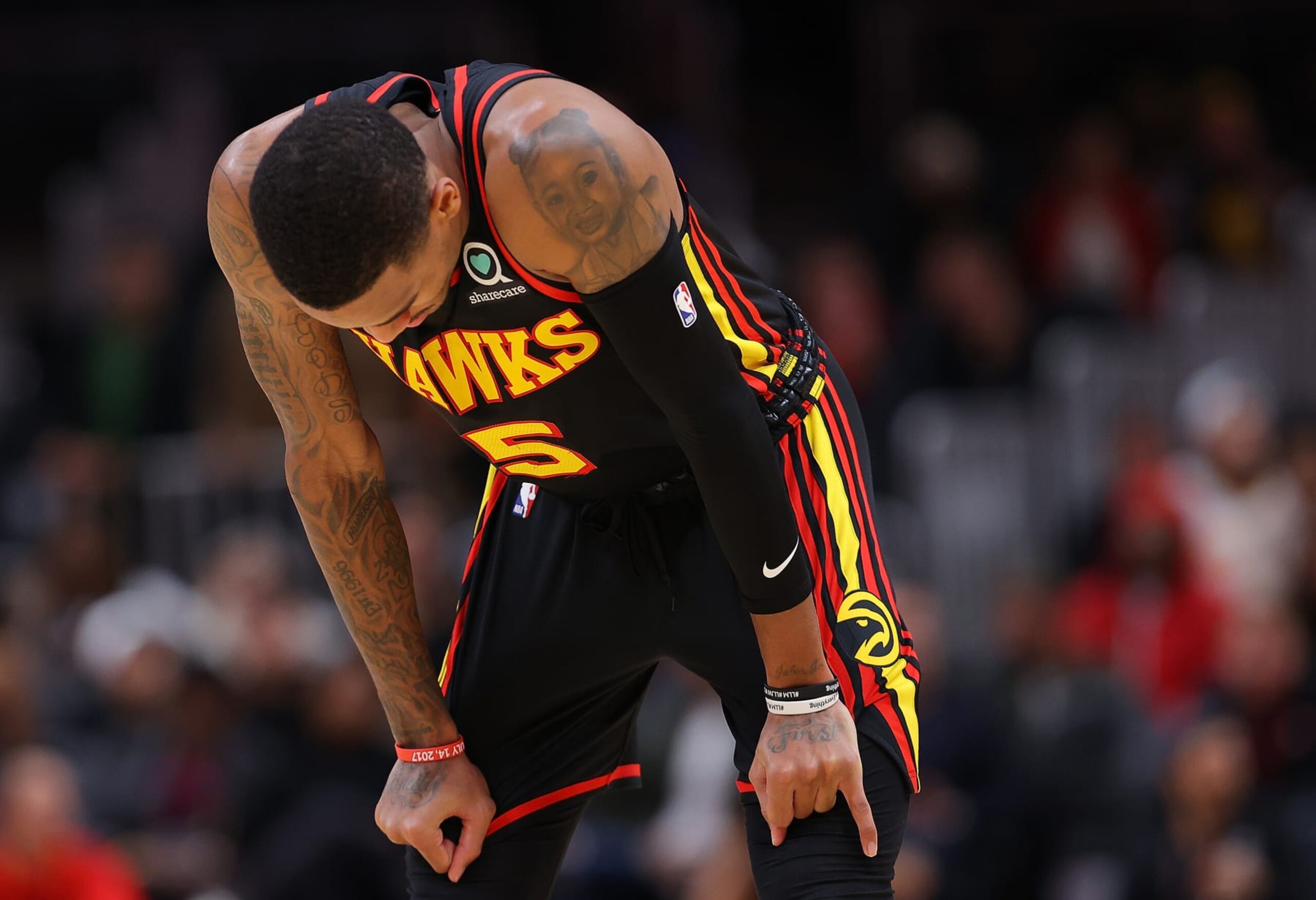 ATLANTA, GEORGIA - DECEMBER 05:  Dejounte Murray #5 of the Atlanta Hawks reacts after missing free throws in the final seconds against the Oklahoma City Thunder during the second half at State Farm Arena on December 05, 2022 in Atlanta, Georgia.  NOTE TO USER: User expressly acknowledges and agrees that, by downloading and or using this photograph, User is consenting to the terms and conditions of the Getty Images License Agreement.  (Photo by Kevin C. Cox/Getty Images)