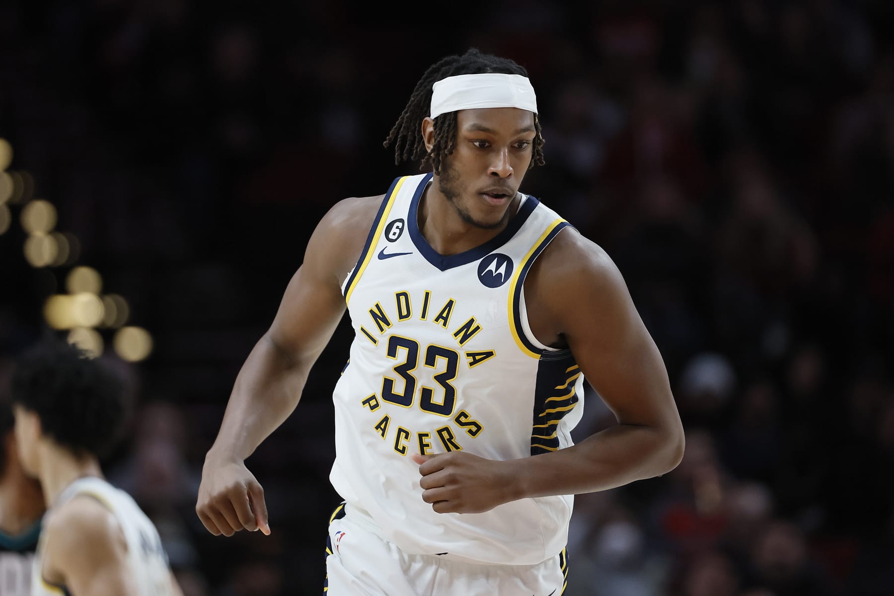 PORTLAND, OREGON - DECEMBER 04: Myles Turner #33 of the Indiana Pacers reacts during the first half against the Portland Trail Blazers at Moda Center on December 04, 2022 in Portland, Oregon. NOTE TO USER: User expressly acknowledges and agrees that, by downloading and or using this photograph, User is consenting to the terms and conditions of the Getty Images License Agreement. (Photo by Soobum Im/Getty Images)