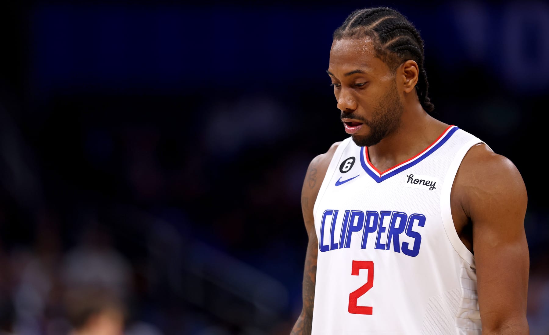 ORLANDO, FLORIDA - DECEMBER 07: Kawhi Leonard #2 of the LA Clippers looks on during a game against the Orlando Magic at Amway Center on December 07, 2022 in Orlando, Florida. (Photo by Mike Ehrmann/Getty Images) NOTE TO USER: User expressly acknowledges and agrees that, by downloading and or using this photograph, User is consenting to the terms and conditions of the Getty Images License Agreement.
