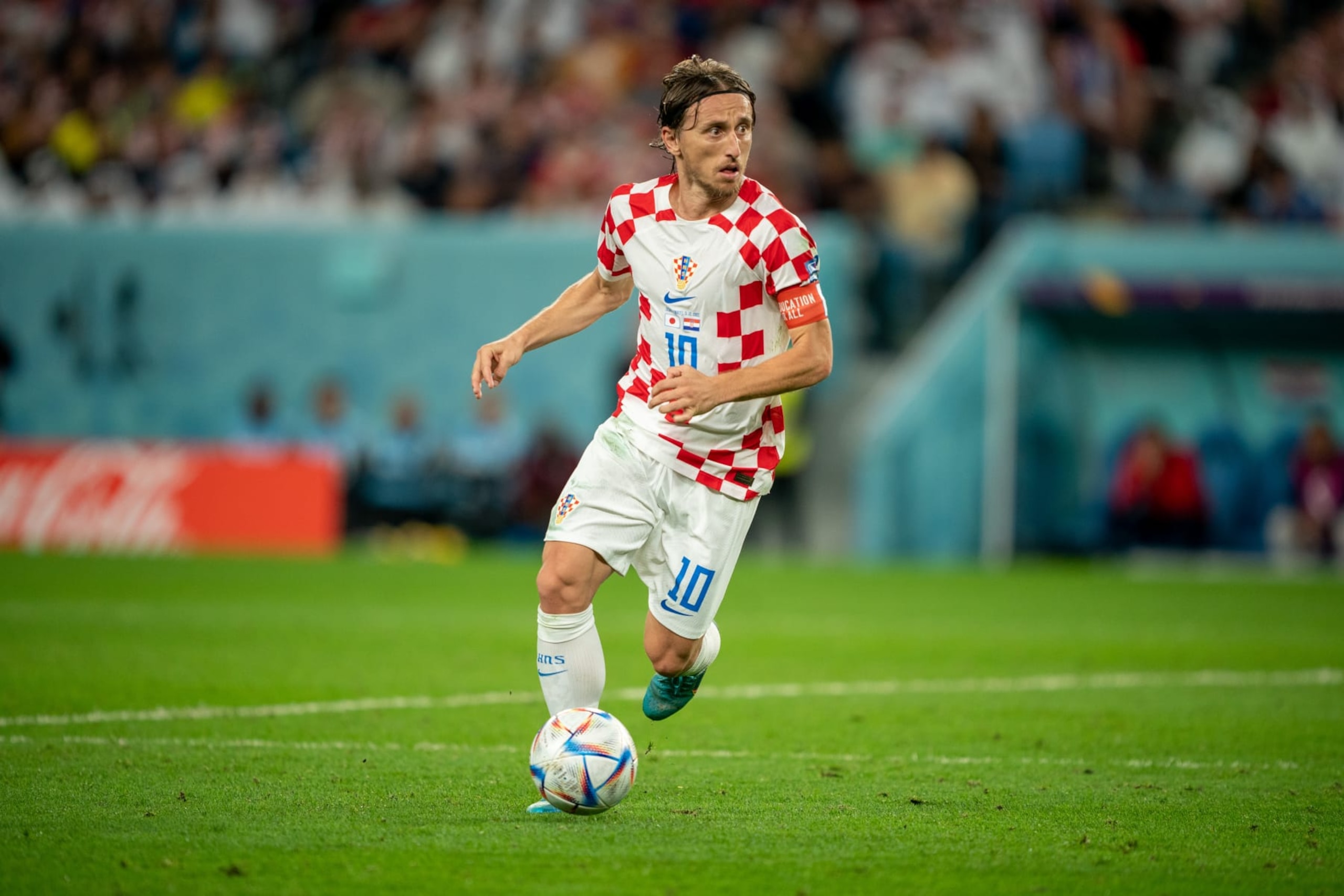 AL WAKRAH, QATAR - DECEMBER 5: Luka Modri #10 of Croatia dribbles the ball during a FIFA World Cup Qatar 2022 Round of 16 game between Croatia and Japan at Al Janoub Stadium on December 5, 2022 in Al Wakrah, Qatar. (Photo by John Todd/ISI Photos/Getty Images).