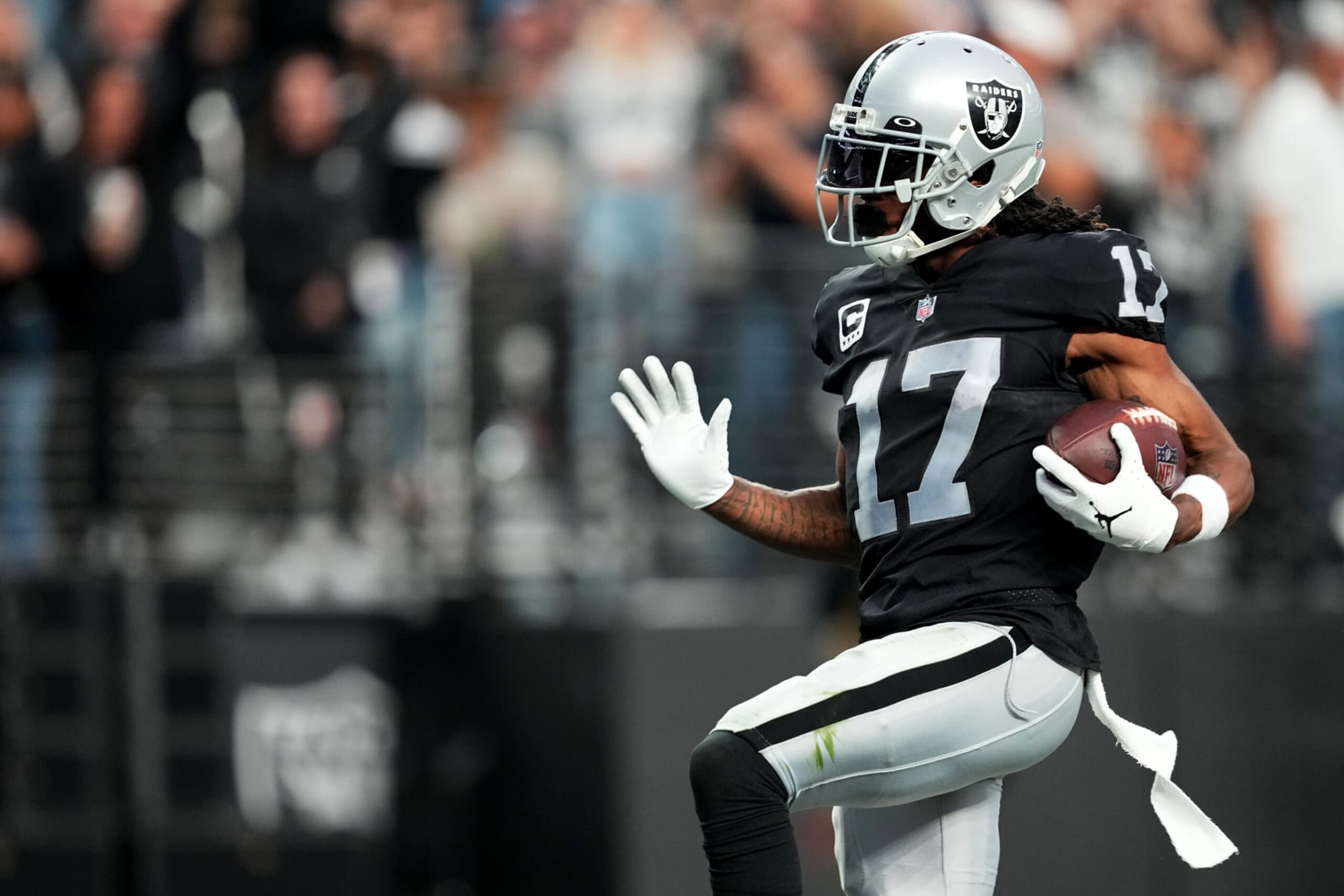 LAS VEGAS, NEVADA - DECEMBER 04: Davante Adams #17 of the Las Vegas Raiders scores a touchdown in the third quarter of a game against the Los Angeles Chargers at Allegiant Stadium on December 04, 2022 in Las Vegas, Nevada. (Photo by Chris Unger/Getty Images) LAS VEGAS, NEVADA - DECEMBER 04: Davante Adams #17 of the Las Vegas Raiders scores a touchdown in the third quarter of a game against the Los Angeles Chargers at Allegiant Stadium on December 04, 2022 in Las Vegas, Nevada. (Photo by Chris Unger/Getty Images)