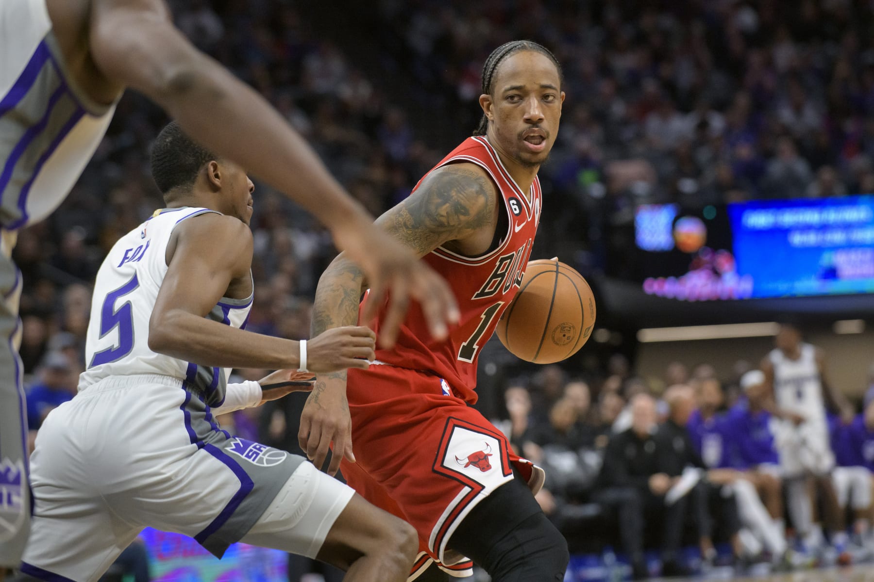 Chicago Bulls forward DeMar DeRozan (11) is guarded by Sacramento Kings guard De'Aaron Fox (5) during the second half of an NBA basketball game in Sacramento, Calif., Sunday, Dec. 4, 2022. The Kings won 110-101. (AP Photo/Randall Benton) Chicago Bulls forward DeMar DeRozan (11) is guarded by Sacramento Kings guard De'Aaron Fox (5) during the second half of an NBA basketball game in Sacramento, Calif., Sunday, Dec. 4, 2022. The Kings won 110-101. (AP Photo/Randall Benton)