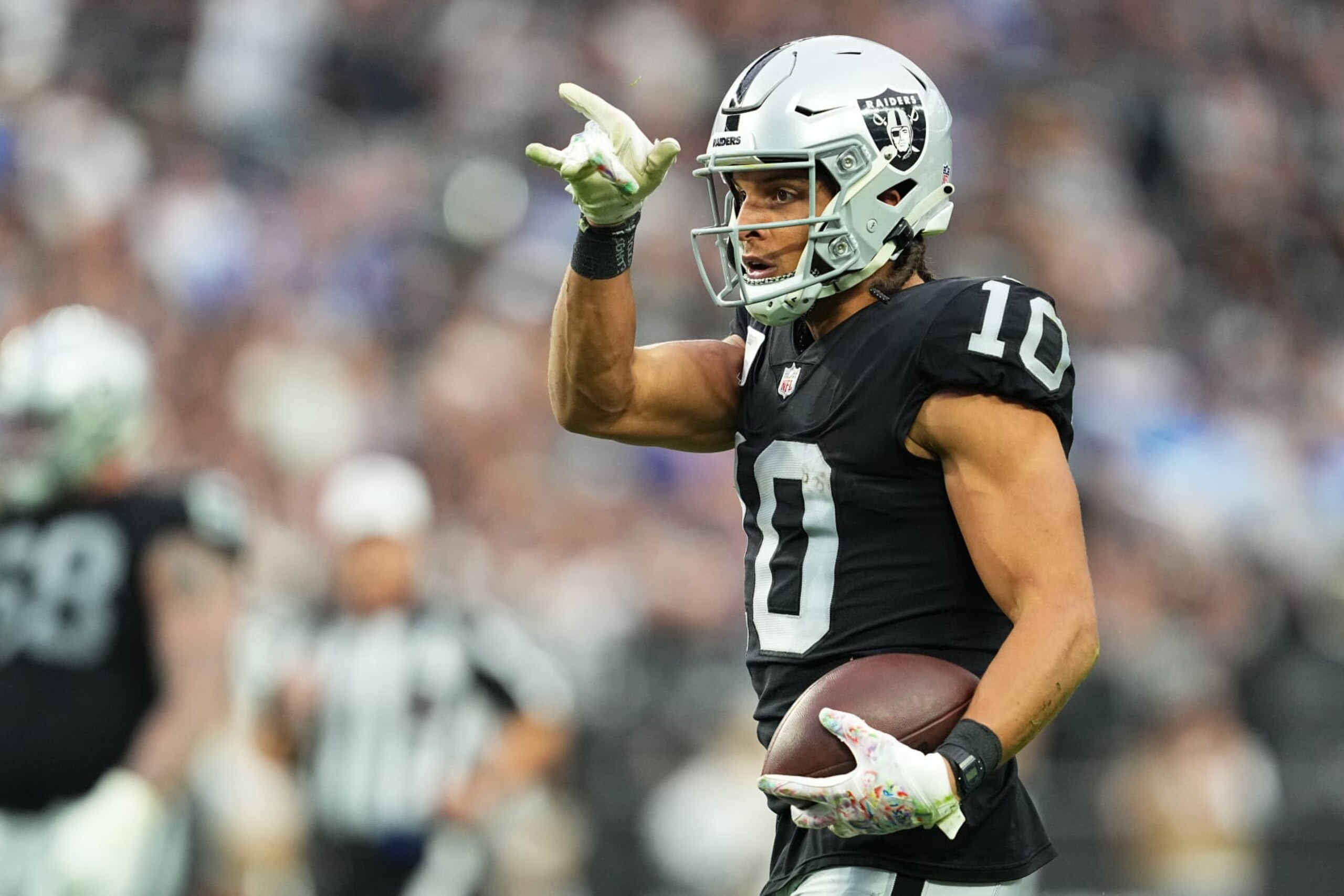 LAS VEGAS, NEVADA - DECEMBER 04: Mack Hollins #10 of the Las Vegas Raiders reacts after a first first down in the first quarter of a game against the Los Angeles Chargers at Allegiant Stadium on December 04, 2022 in Las Vegas, Nevada. (Photo by Chris Unger/Getty Images) LAS VEGAS, NEVADA - DECEMBER 04: Mack Hollins #10 of the Las Vegas Raiders reacts after a first first down in the first quarter of a game against the Los Angeles Chargers at Allegiant Stadium on December 04, 2022 in Las Vegas, Nevada. (Photo by Chris Unger/Getty Images)