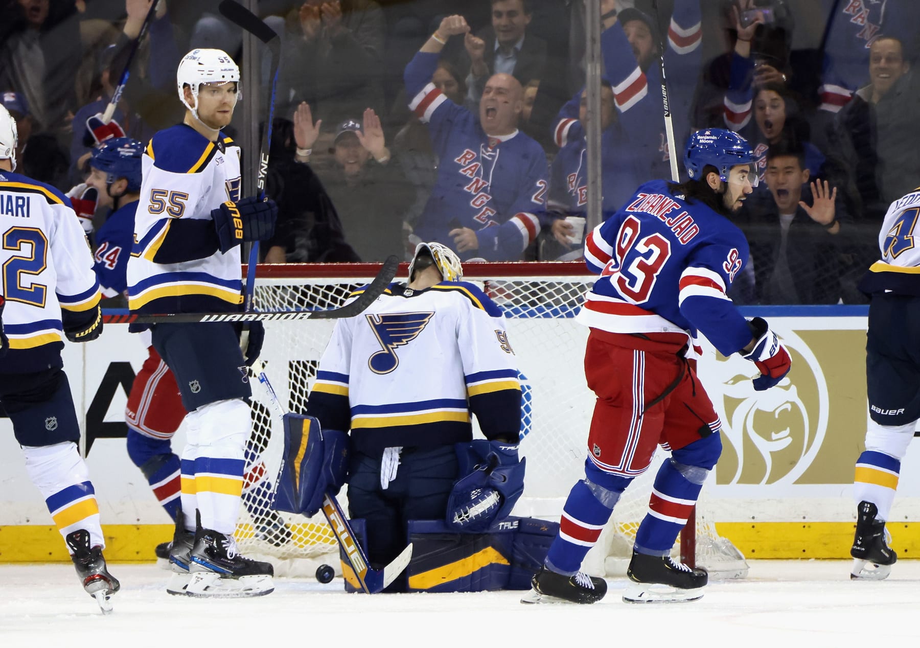 NEW YORK, NEW YORK - DECEMBER 05: Mika Zibanejad #93 of the New York Rangers celebrates the game winning goal by Alexis Lafreniere #13 against Jordan Binnington #50 of the St. Louis Blues at Madison Square Garden on December 05, 2022 in New York City. he Rangers defeated the Blues 6-4.  (Photo by Bruce Bennett/Getty Images)
