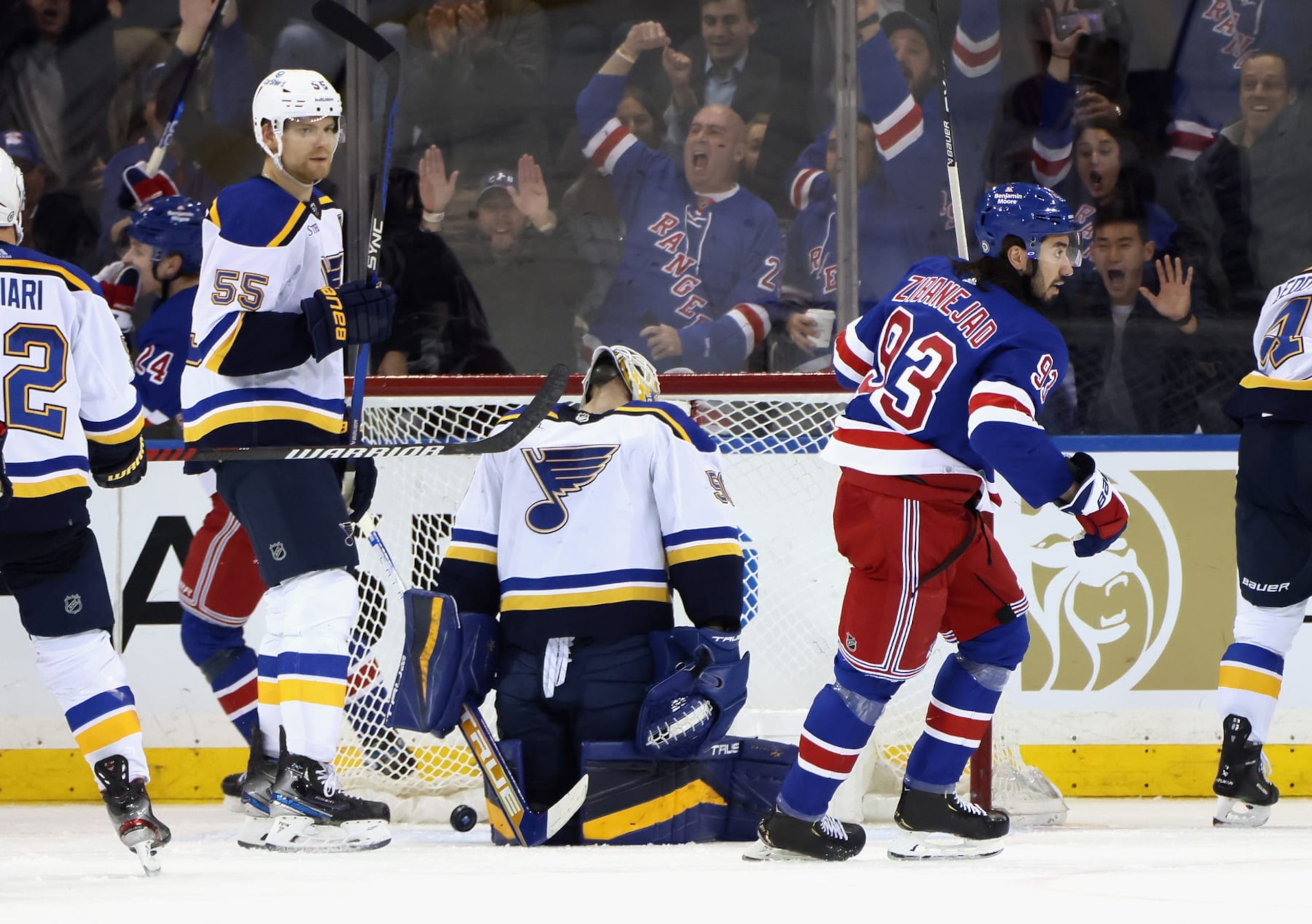 NEW YORK, NEW YORK - DECEMBER 05: Mika Zibanejad #93 of the New York Rangers celebrates the game winning goal by Alexis Lafreniere #13 against Jordan Binnington #50 of the St. Louis Blues at Madison Square Garden on December 05, 2022 in New York City. he Rangers defeated the Blues 6-4.  (Photo by Bruce Bennett/Getty Images)