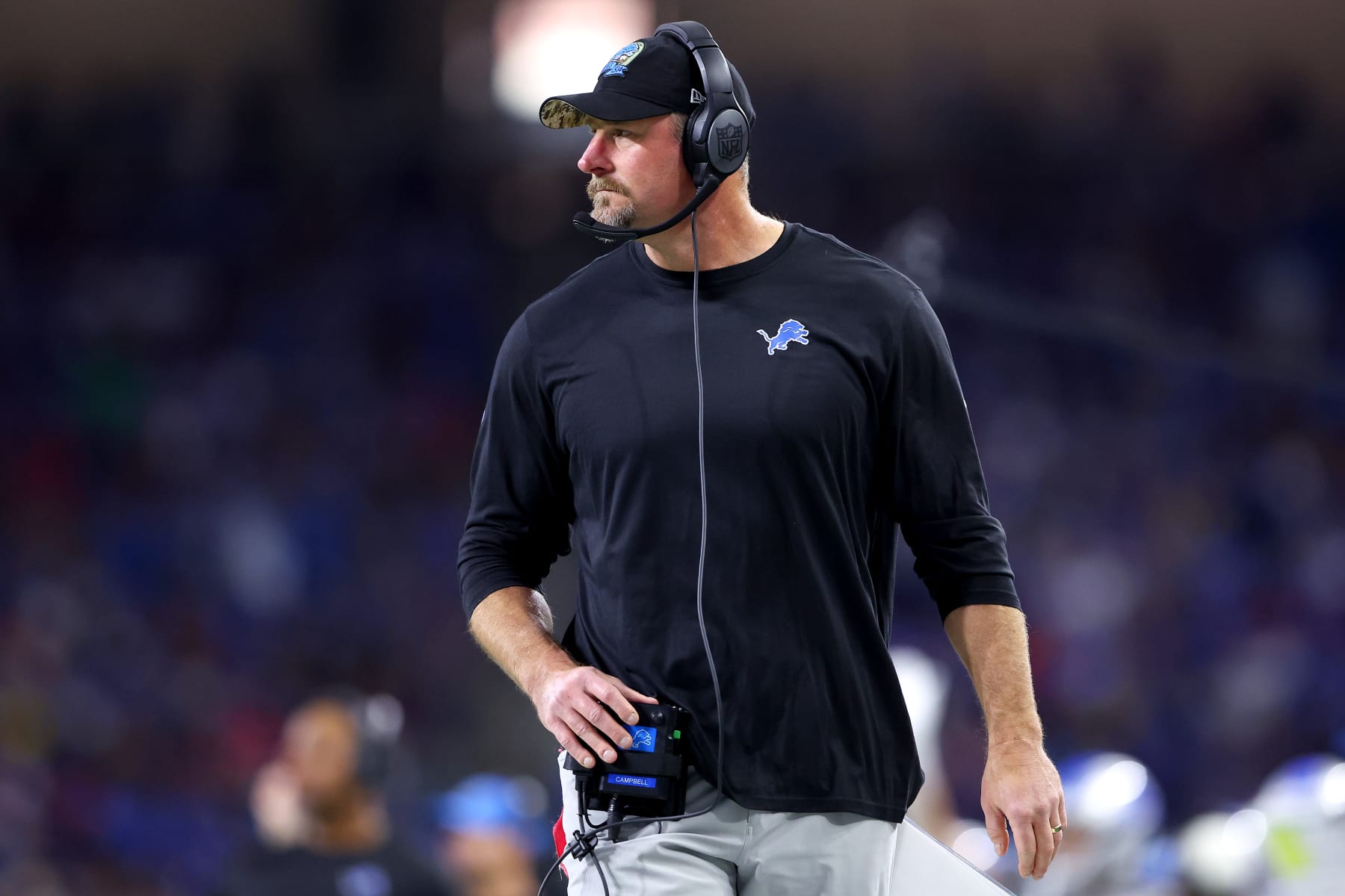 DETROIT, MICHIGAN - NOVEMBER 24: Head coach Dan Campbell of the Detroit Lions looks on against the Buffalo Bills during the first quarter at Ford Field on November 24, 2022 in Detroit, Michigan. (Photo by Rey Del Rio/Getty Images)