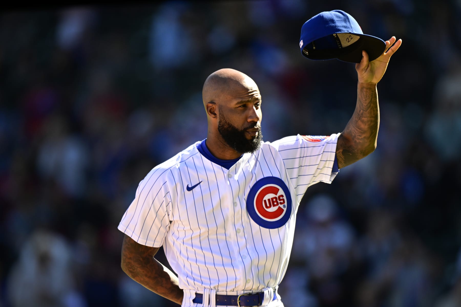 CHICAGO, ILLINOIS - OCTOBER 01: Jason Heyward #22 of the Chicago Cubs tips his hat after being honored in the fourth inning against the Cincinnati Reds at Wrigley Field on October 01, 2022 in Chicago, Illinois. (Photo by Quinn Harris/Getty Images)