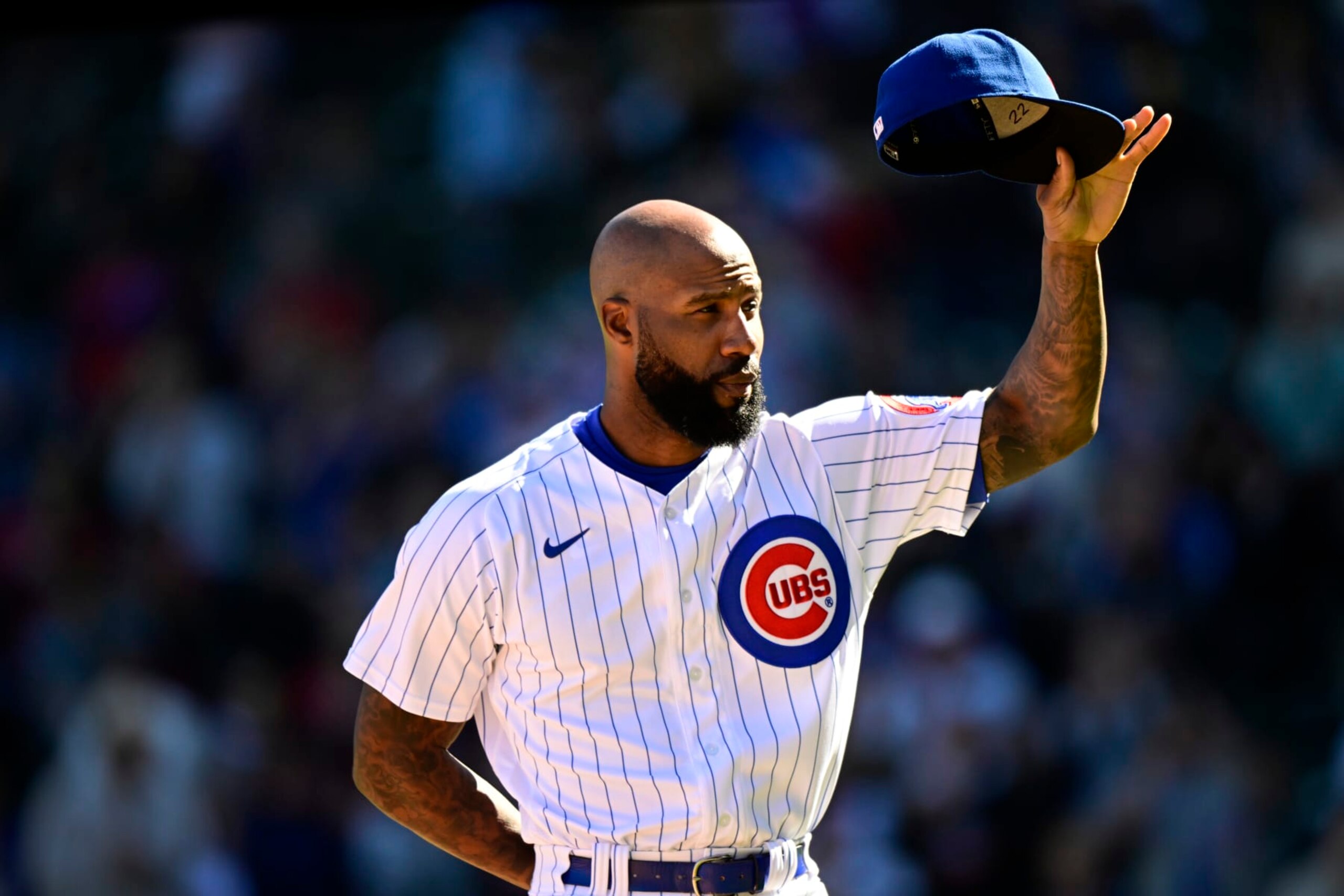 CHICAGO, ILLINOIS - OCTOBER 01: Jason Heyward #22 of the Chicago Cubs tips his hat after being honored in the fourth inning against the Cincinnati Reds at Wrigley Field on October 01, 2022 in Chicago, Illinois. (Photo by Quinn Harris/Getty Images)
