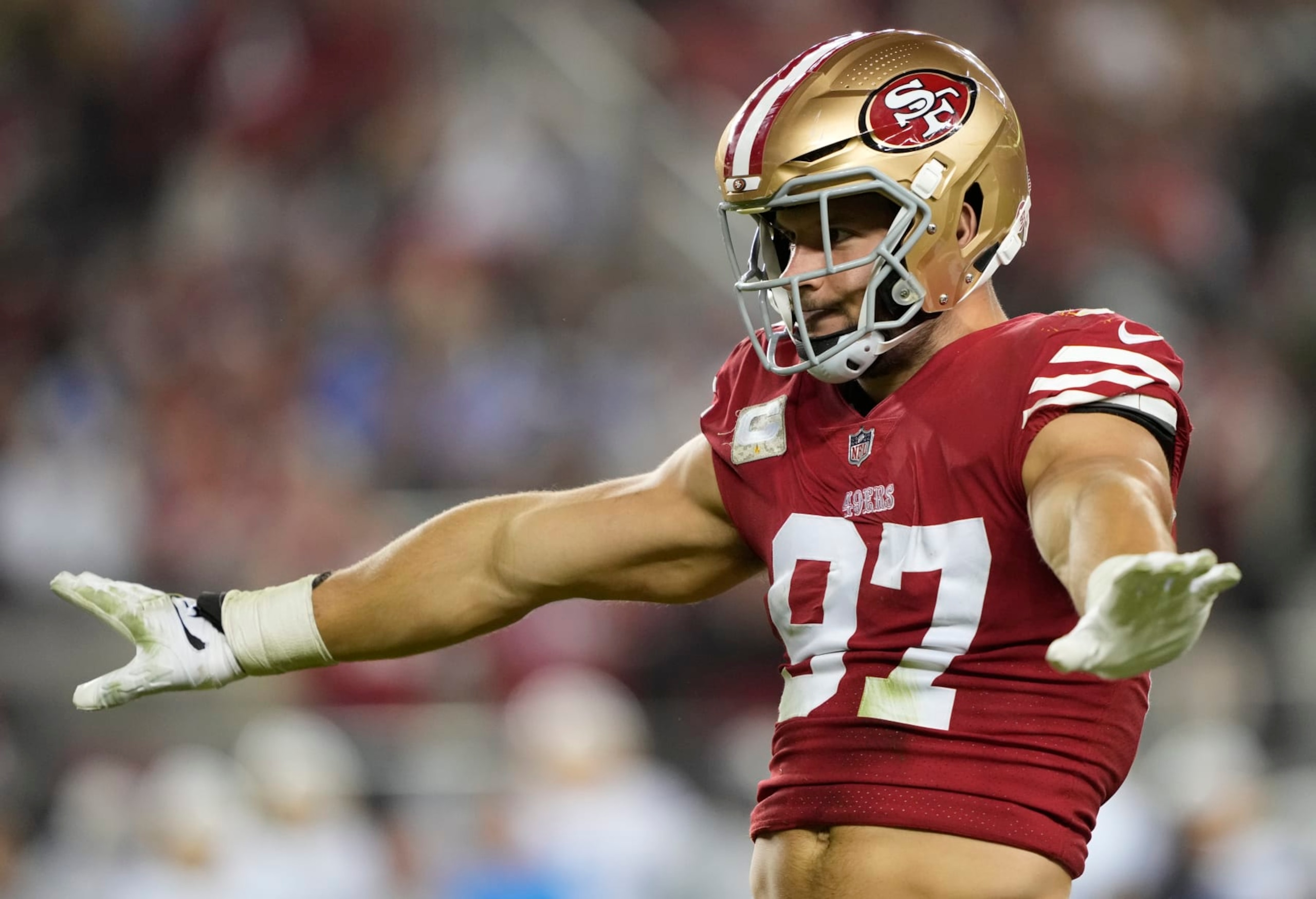 SANTA CLARA, CALIFORNIA - NOVEMBER 13: Nick Bosa #97 of the San Francisco 49ers reacts after a tackle during the fourth quarter against the Los Angeles Chargers at Levi's Stadium on November 13, 2022 in Santa Clara, California. (Photo by Thearon W. Henderson/Getty Images)