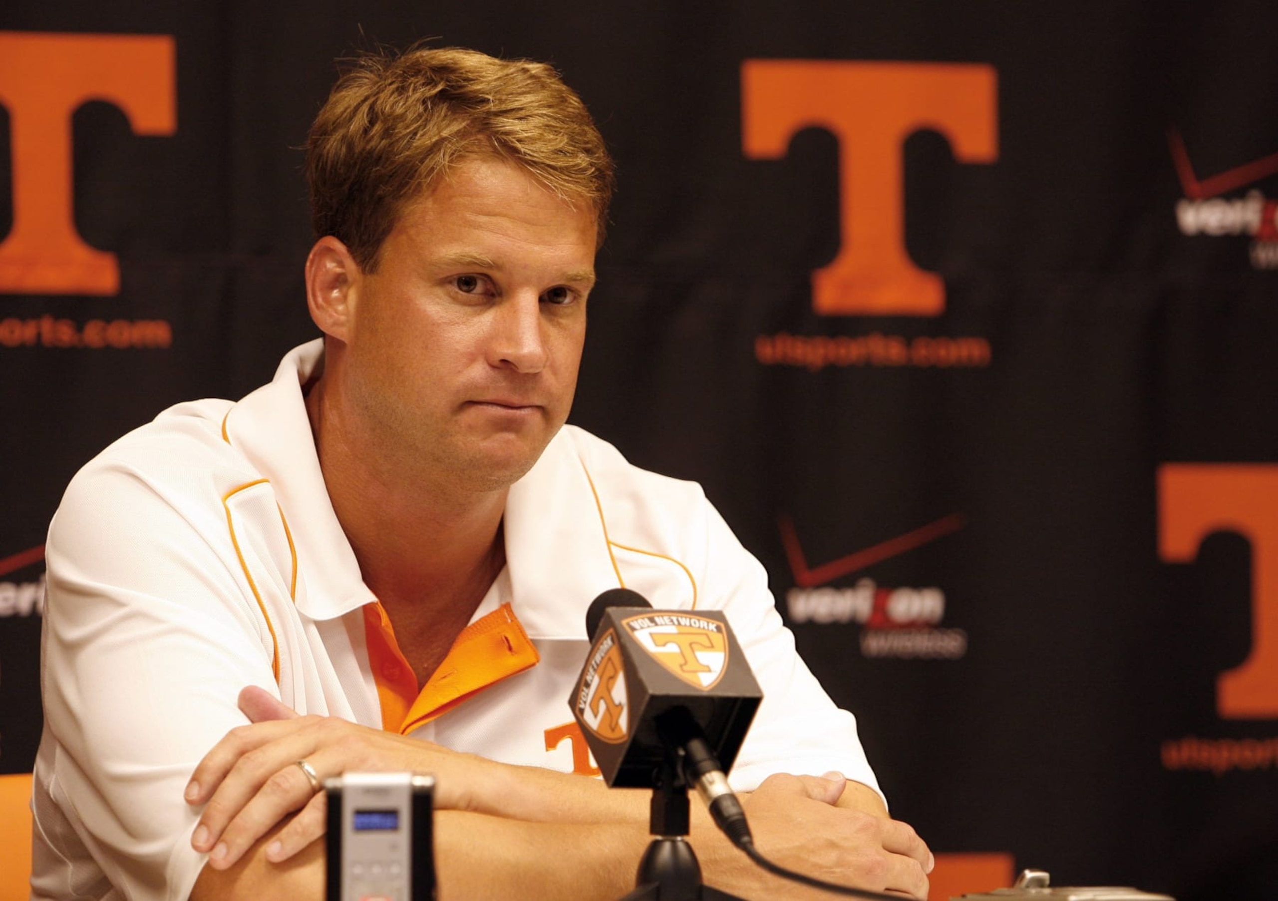KNOXVILLE, TN - SEPTEMBER 12: Lane Kiffin, head coach of the Tennessee Volunteers talks in the press conference after a game against the UCLA Bruins on September 12, 2009 at Neyland Stadium in Knoxville, Tennessee. UCLA beat Tennessee 19-15. (Photo by Joe Murphy/Getty Images)