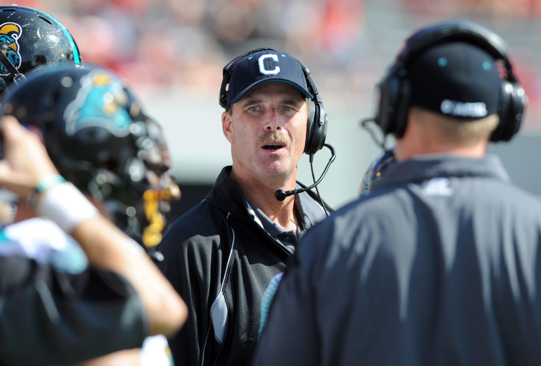 Coastal Carolina head football coach David Bennett watches his team play Georgia in the second half of an NCAA college football game at Sanford Stadium on Saturday, Sept. 17, 2011, in Athens, Ga. Georgia defeated Coastal Carolina 59-0. (AP Photo/Erik S. Lesser)