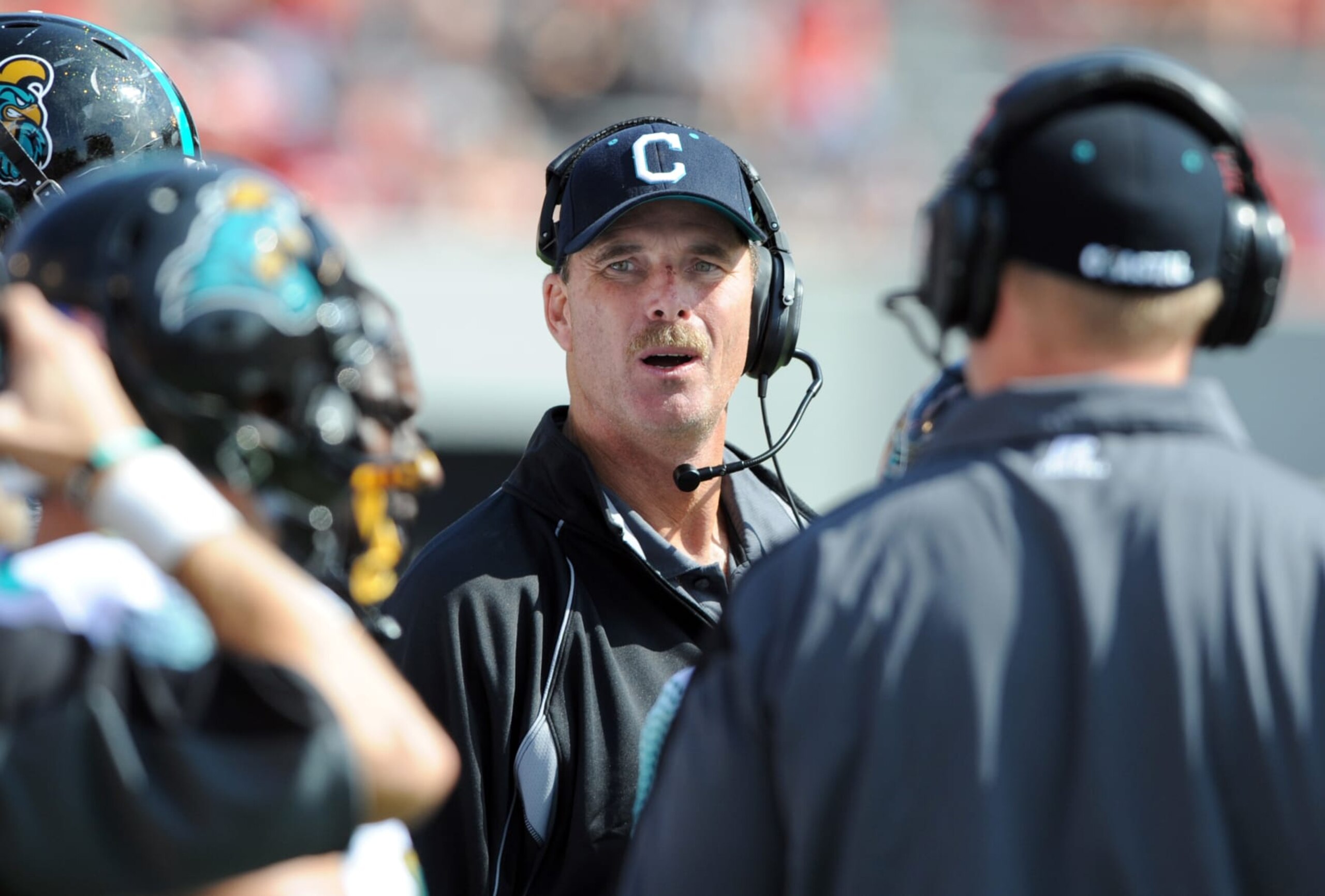 Coastal Carolina head football coach David Bennett watches his team play Georgia in the second half of an NCAA college football game at Sanford Stadium on Saturday, Sept. 17, 2011, in Athens, Ga. Georgia defeated Coastal Carolina 59-0. (AP Photo/Erik S. Lesser)