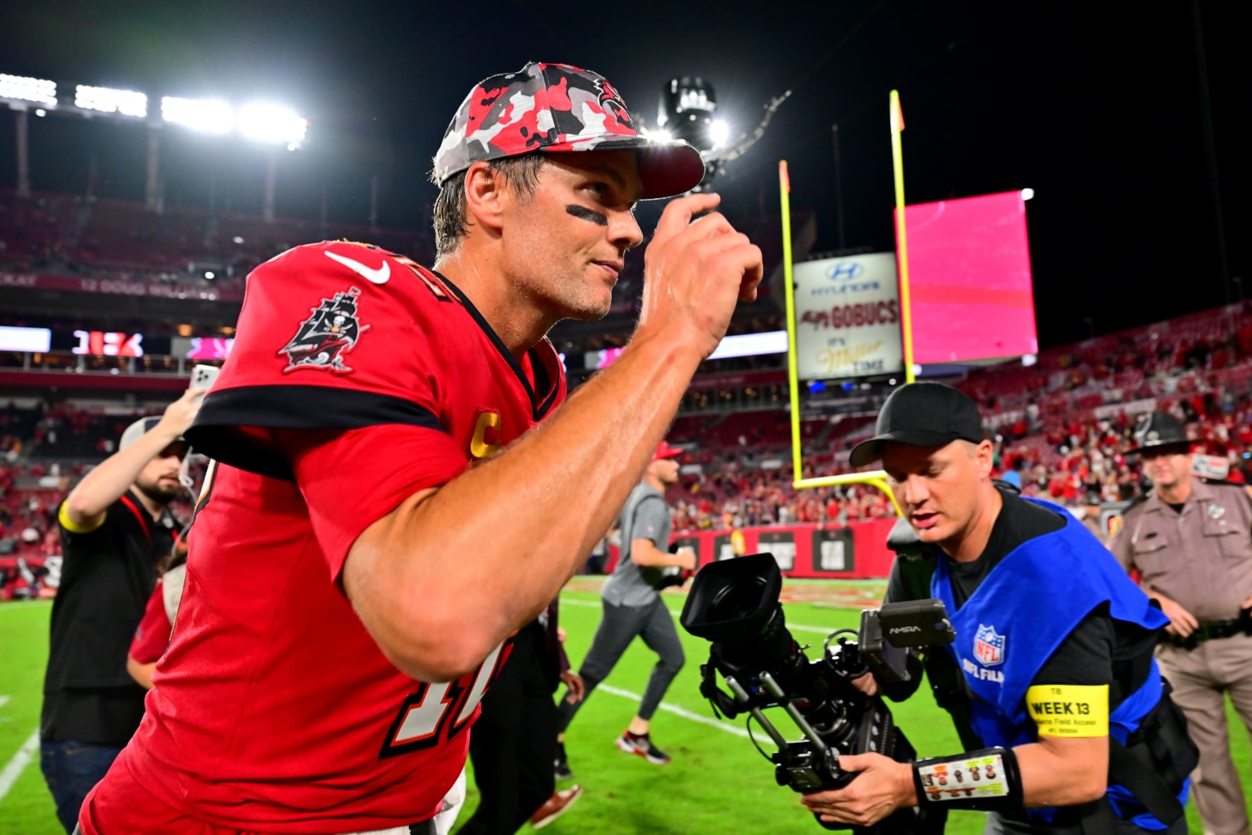 TAMPA, FLORIDA - DECEMBER 05: Tom Brady #12 of the Tampa Bay Buccaneers runs off the field after defeating the New Orleans Saints in the game at Raymond James Stadium on December 05, 2022 in Tampa, Florida. The Tampa Bay Buccaneers defeated the New Orleans Saints with a score of 17 to 16. (Photo by Julio Aguilar/Getty Images)