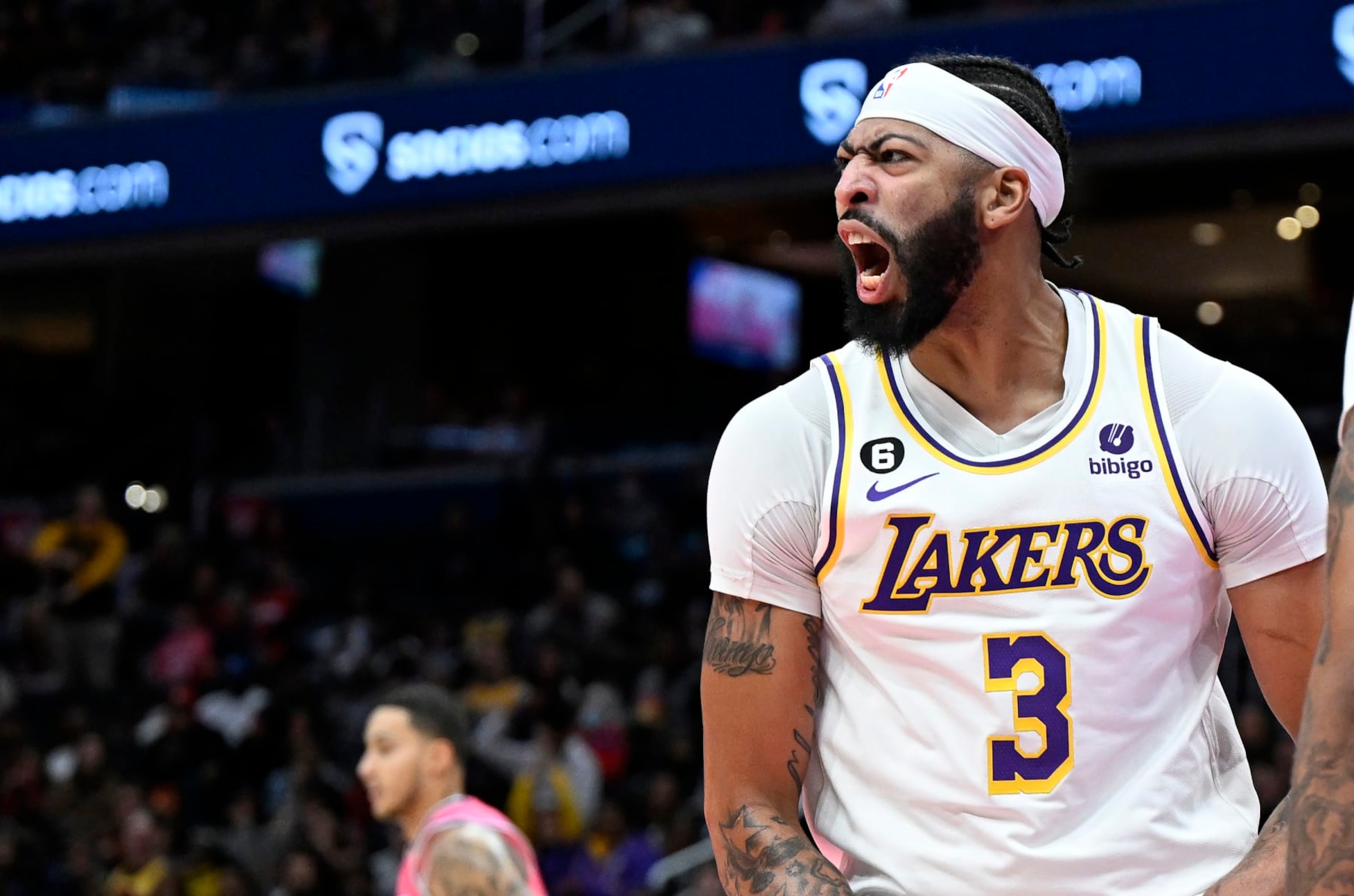 WASHINGTON, DC - DECEMBER 04: Anthony Davis #3 of the Los Angeles Lakers celebrates after dunking the ball against the Washington Wizards at Capital One Arena on December 04, 2022 in Washington, DC. NOTE TO USER: User expressly acknowledges and agrees that, by downloading and or using this photograph, User is consenting to the terms and conditions of the Getty Images License Agreement. (Photo by G Fiume/Getty Images) WASHINGTON, DC - DECEMBER 04: Anthony Davis #3 of the Los Angeles Lakers celebrates after dunking the ball against the Washington Wizards at Capital One Arena on December 04, 2022 in Washington, DC. NOTE TO USER: User expressly acknowledges and agrees that, by downloading and or using this photograph, User is consenting to the terms and conditions of the Getty Images License Agreement. (Photo by G Fiume/Getty Images)