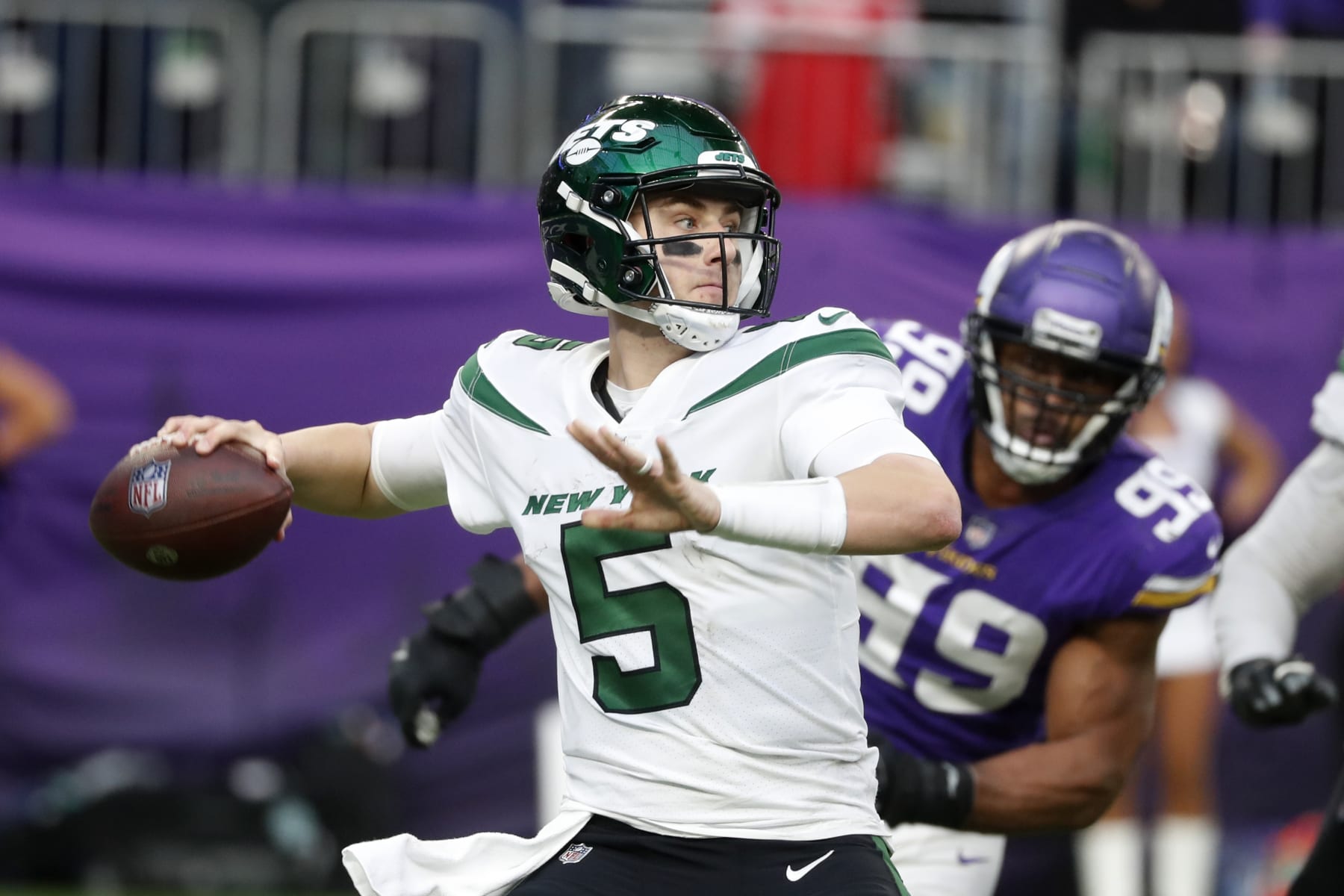 New York Jets quarterback Mike White (5) throws a pass during the second half of an NFL football game against the Minnesota Vikings, Sunday, Dec. 4, 2022, in Minneapolis. (AP Photo/Bruce Kluckhohn) New York Jets quarterback Mike White (5) throws a pass during the second half of an NFL football game against the Minnesota Vikings, Sunday, Dec. 4, 2022, in Minneapolis. (AP Photo/Bruce Kluckhohn)