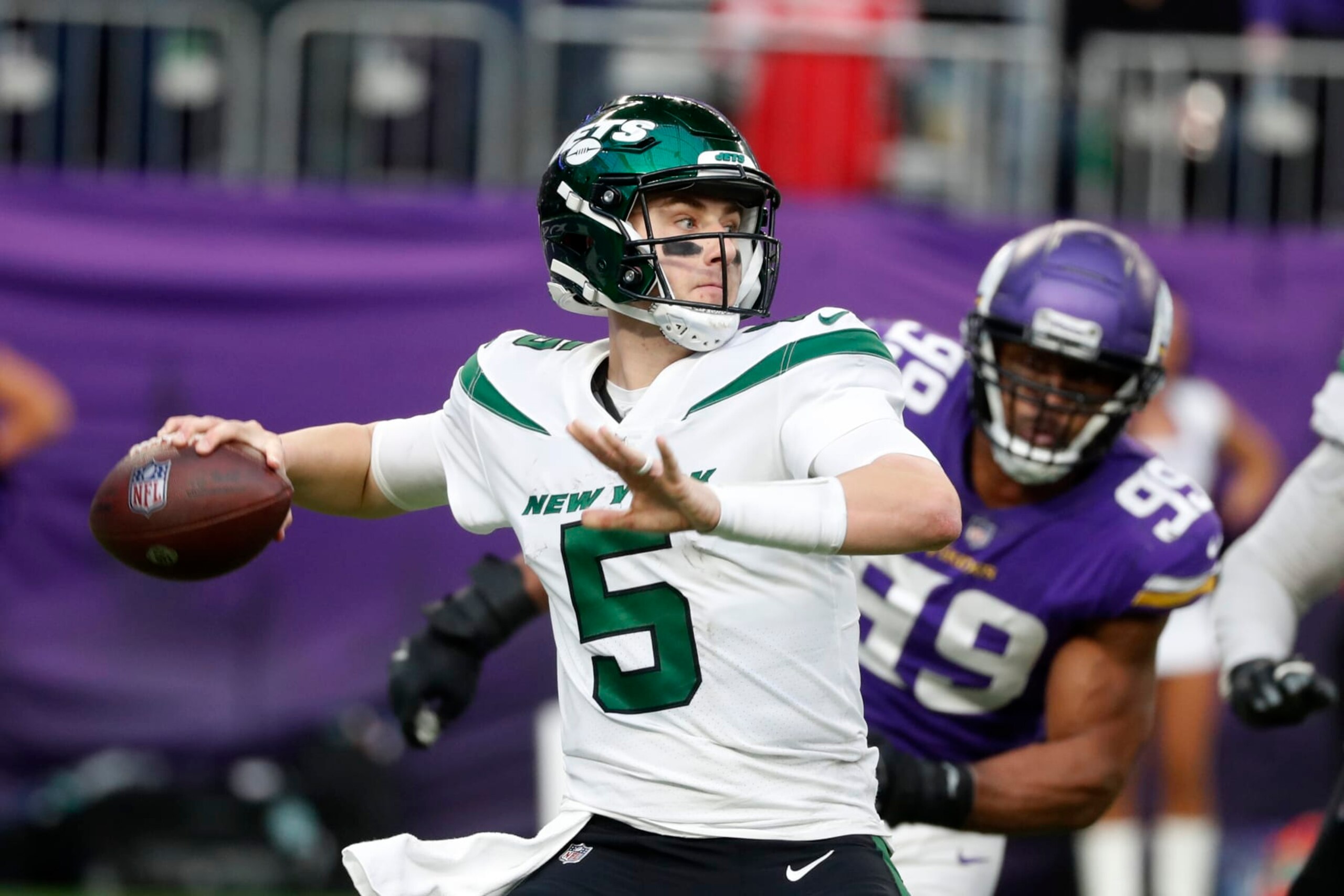 New York Jets quarterback Mike White (5) throws a pass during the second half of an NFL football game against the Minnesota Vikings, Sunday, Dec. 4, 2022, in Minneapolis. (AP Photo/Bruce Kluckhohn)