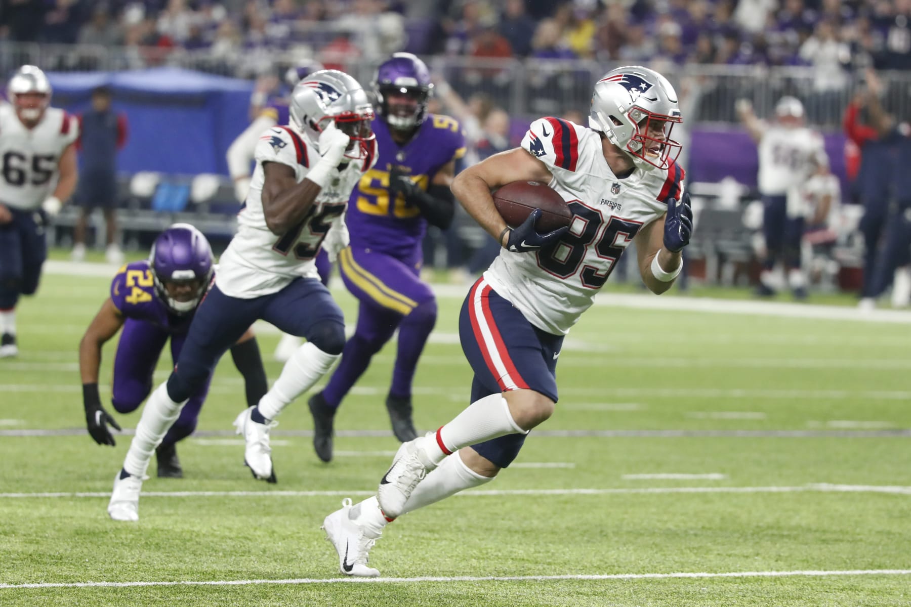 New England Patriots tight end Hunter Henry (85) runs up field during a 37-yard touchdown reception in the second half of an NFL football game against the Minnesota Vikings, Thursday, Nov. 24, 2022, in Minneapolis. (AP Photo/Bruce Kluckhohn) New England Patriots tight end Hunter Henry (85) runs up field during a 37-yard touchdown reception in the second half of an NFL football game against the Minnesota Vikings, Thursday, Nov. 24, 2022, in Minneapolis. (AP Photo/Bruce Kluckhohn)