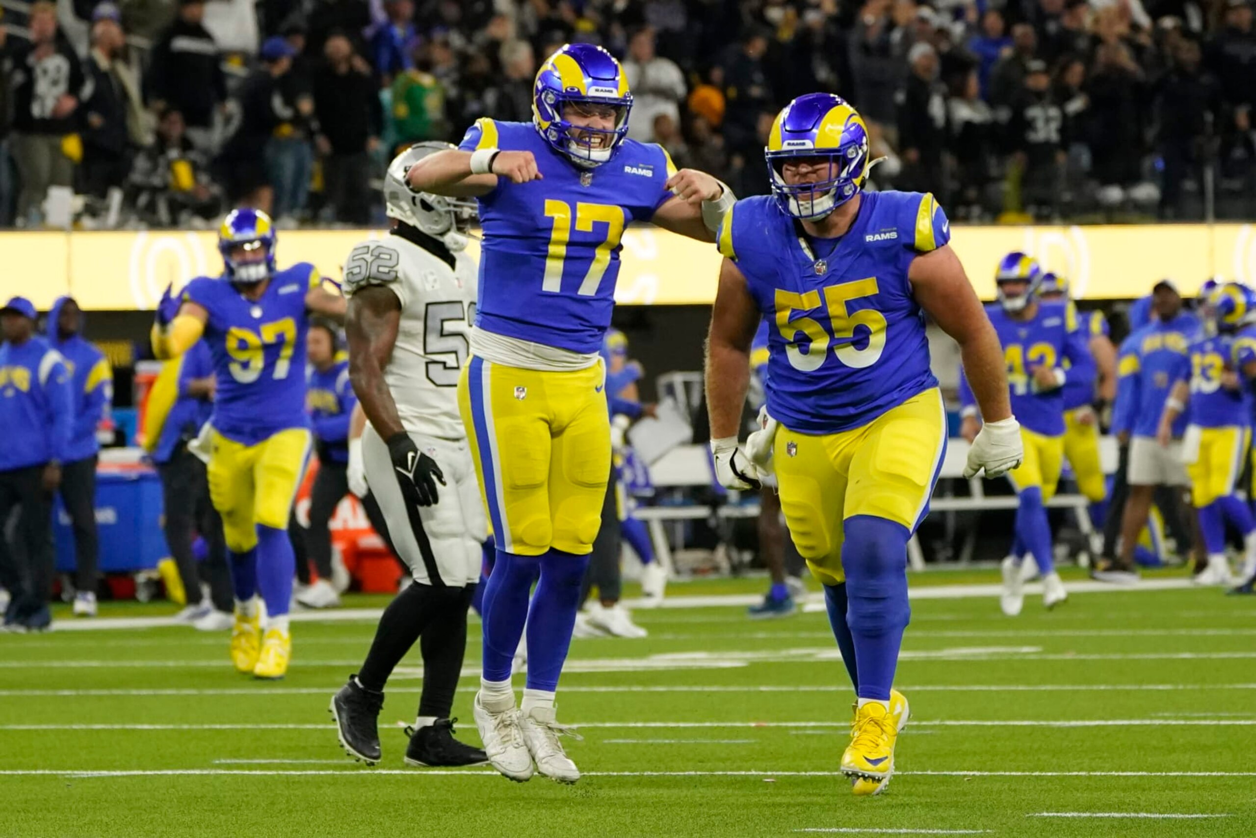 Los Angeles Rams quarterback Baker Mayfield (17) celebrates a touchdown by wide receiver Van Jefferson during the second half of an NFL football game against the Las Vegas Raiders, Thursday, Dec. 8, 2022, in Inglewood, Calif. (AP Photo/Marcio Jose Sanchez) Los Angeles Rams quarterback Baker Mayfield (17) celebrates a touchdown by wide receiver Van Jefferson during the second half of an NFL football game against the Las Vegas Raiders, Thursday, Dec. 8, 2022, in Inglewood, Calif. (AP Photo/Marcio Jose Sanchez)