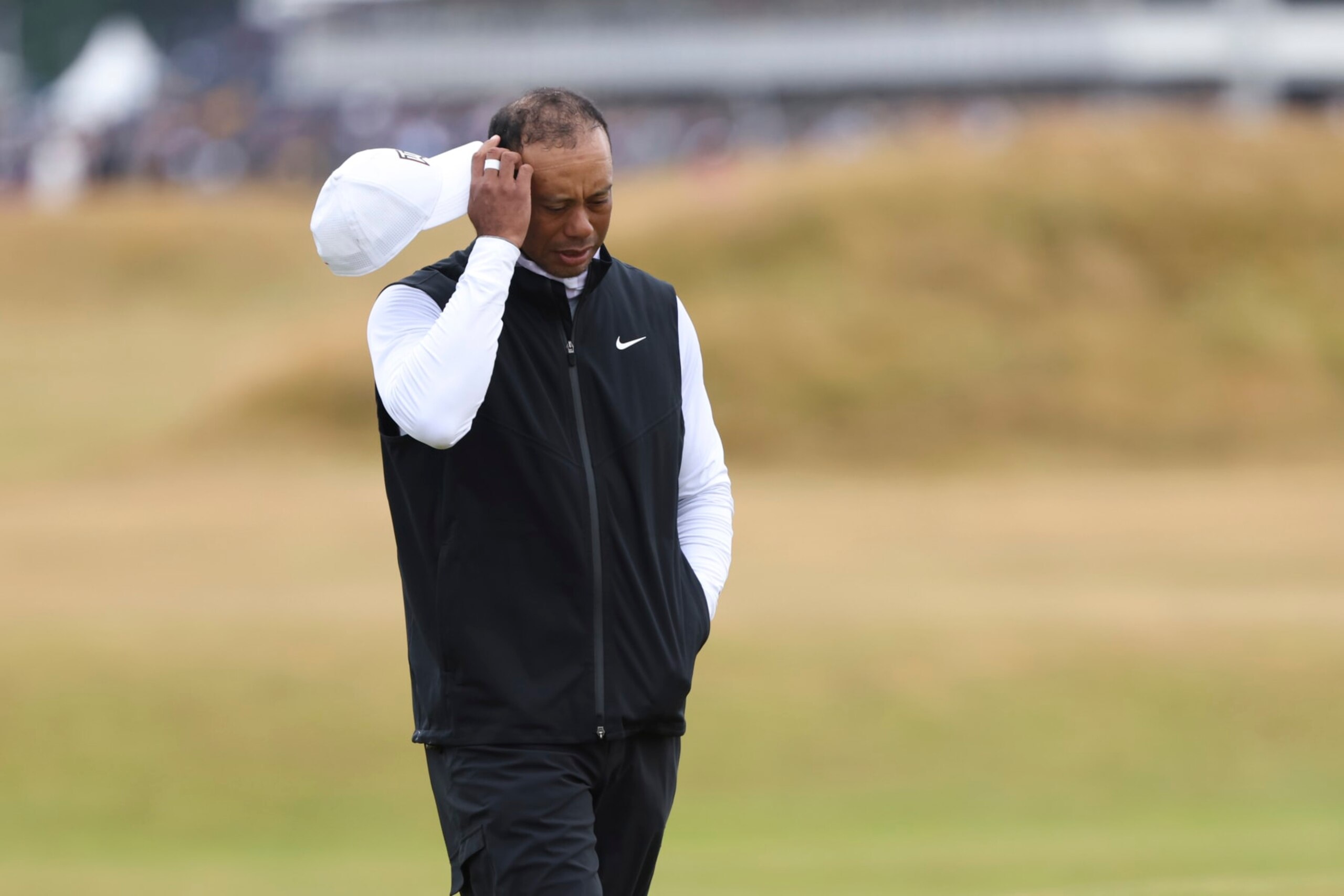 Tiger Woods of the US walks along the 3rd fairway during the second round of the British Open golf championship on the Old Course at St. Andrews, Scotland, Friday July 15, 2022. The Open Championship returns to the home of golf on July 14-17, 2022, to celebrate the 150th edition of the sport's oldest championship, which dates to 1860 and was first played at St. Andrews in 1873. (AP Photo/Peter Morrison)