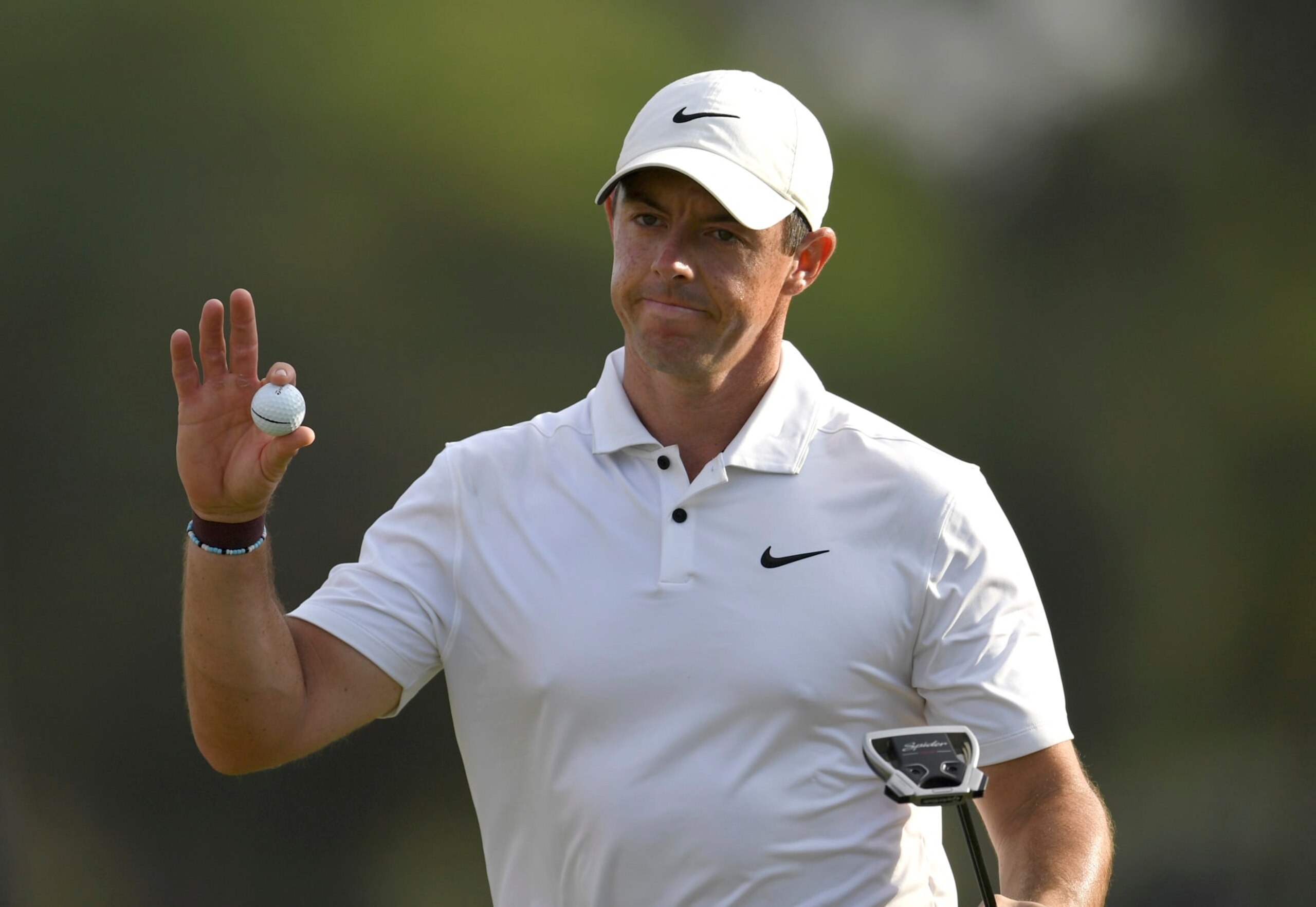 Rory McIlroy of Northern Ireland reacts after finishing on the 18th green during DP World Tour Championship in Dubai, United Arab Emirates, Sunday, Nov. 20, 2022. (AP Photo/Martin Dokoupil)