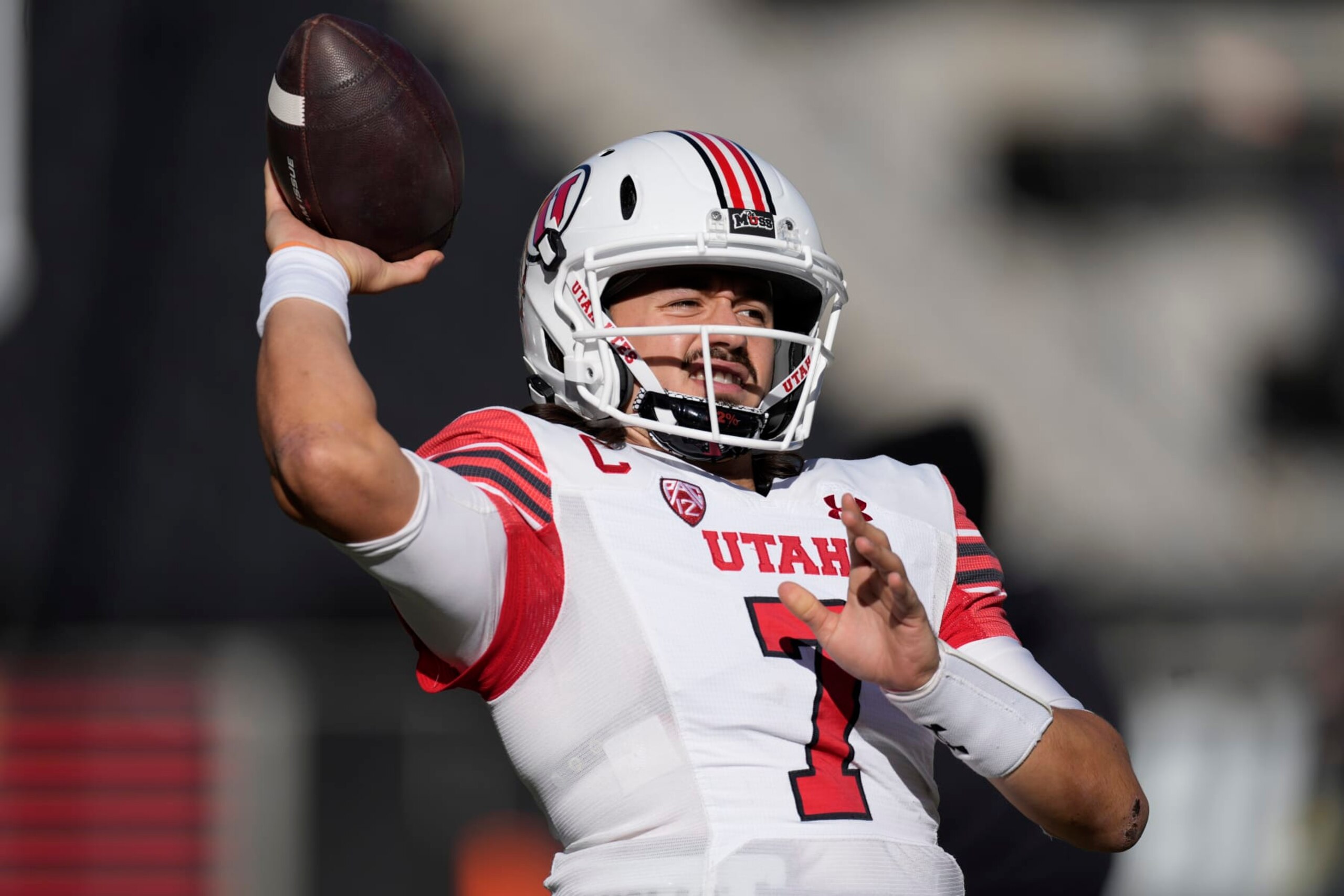 Utah quarterback Cameron Rising warms up before an NCAA college football game against Colorado, Saturday, Nov. 26, 2022, in Boulder, Colo. (AP Photo/David Zalubowski)
