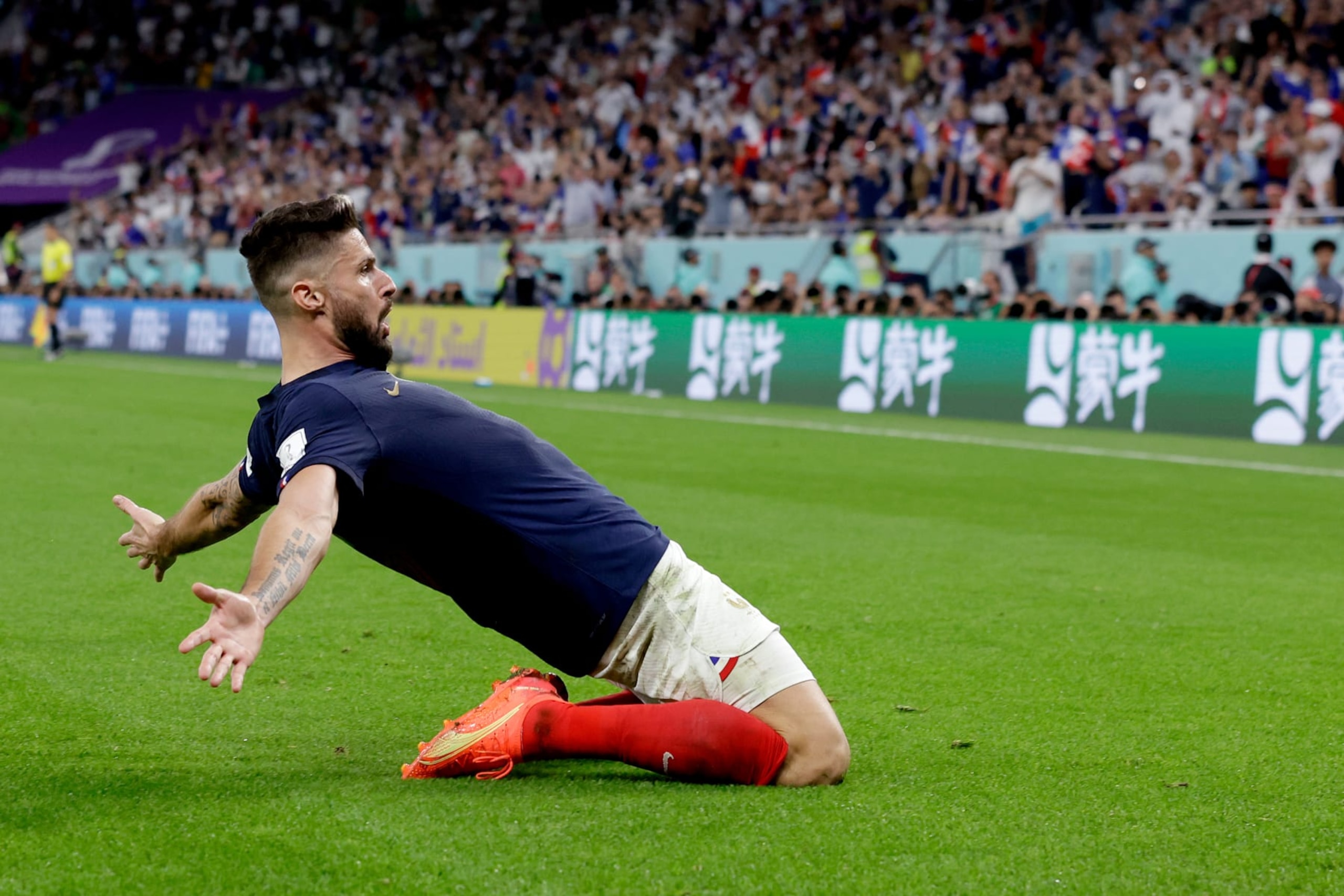 DOHA, QATAR - DECEMBER 4: Oliver Giroud of France celebrates 1-0 during the  World Cup match between France  v Poland at the Al Thumama Stadium on December 4, 2022 in Doha Qatar (Photo by Eric Verhoeven/Soccrates/Getty Images)