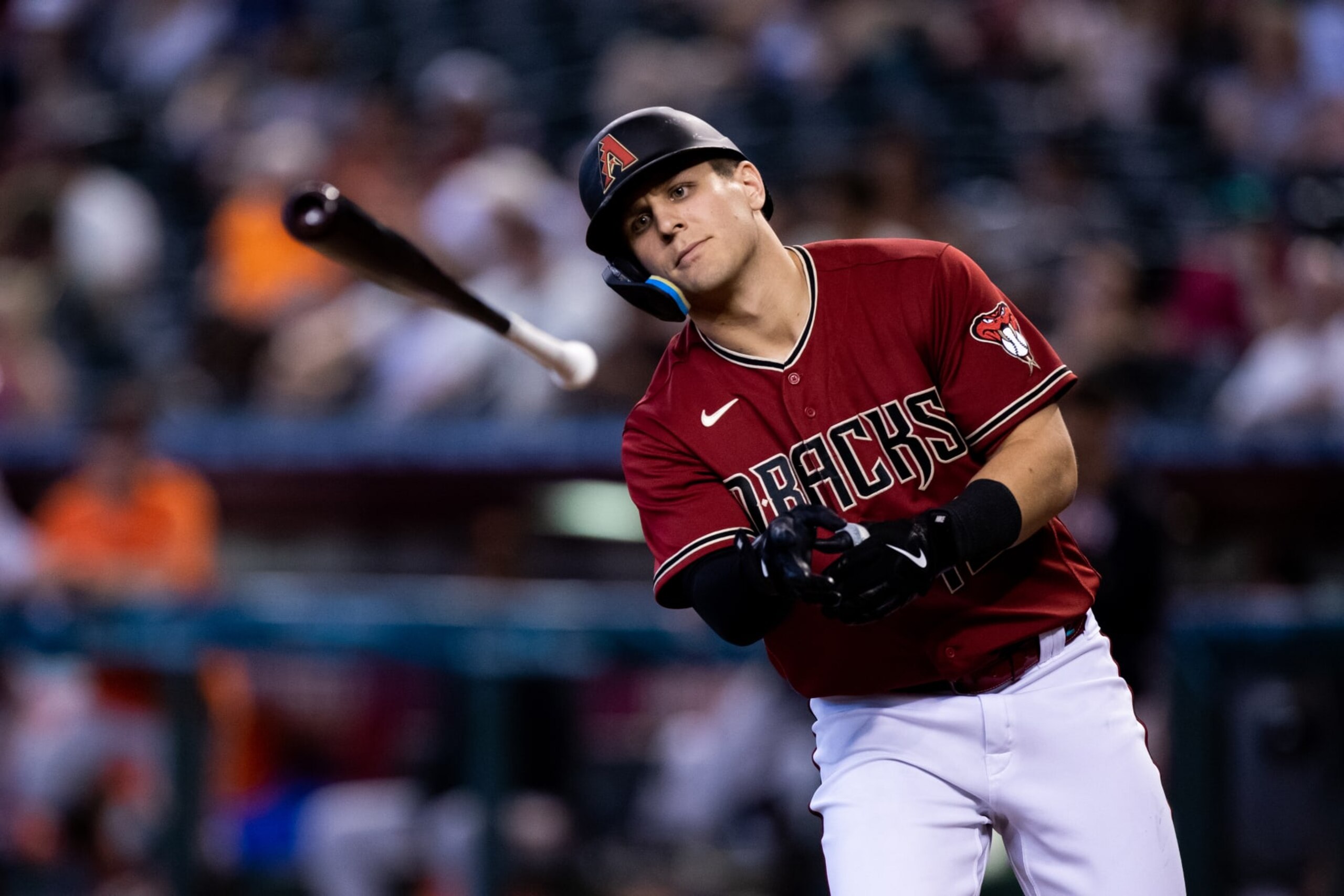 PHOENIX, AZ - SEPTEMBER 25: Arizona Diamondbacks Catcher Daulton Varsho (12) tosses hit bat after ball four during a baseball game between the San Francisco Giants and the Arizona Diamondbacks on September 25, 2022, at Chase Field in Phoenix, AZ. (Photo by Zac BonDurant/Icon Sportswire via Getty Images)