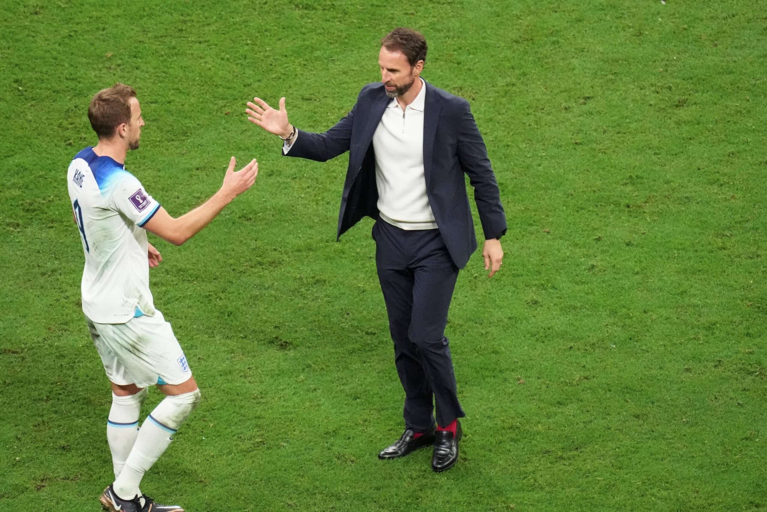 Harry Kane L of England reacts with Gareth Southgate, head coach of England, after the Round of 16 match between England and Senegal of the 2022 FIFA World Cup at Al Bayt Stadium in Al Khor, Qatar, Dec. 4, 2022. (Photo by Li Gang/Xinhua via Getty Images)