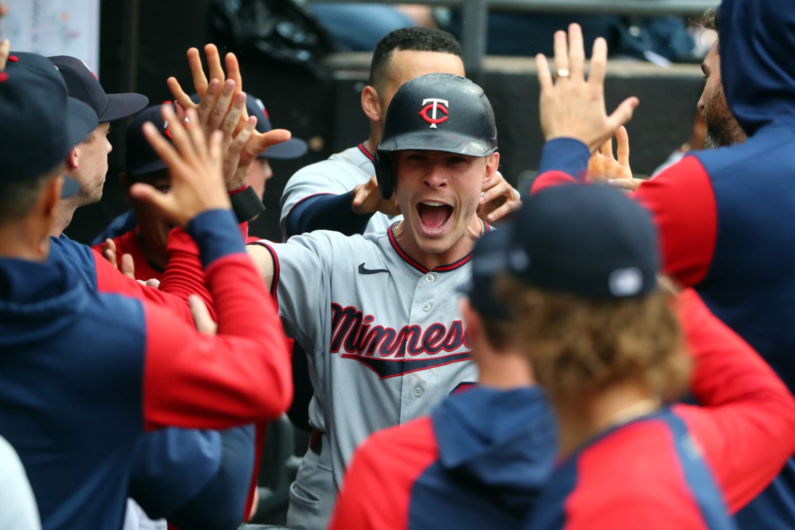 CHICAGO, ILLINOIS - SEPTEMBER 04: Max Kepler #26 of the Minnesota Twins celebrates in the dugout after scoring in the eighth inning against the Chicago White Sox at Guaranteed Rate Field on September 04, 2022 in Chicago, Illinois. (Photo by Chase Agnello-Dean/Getty Images)