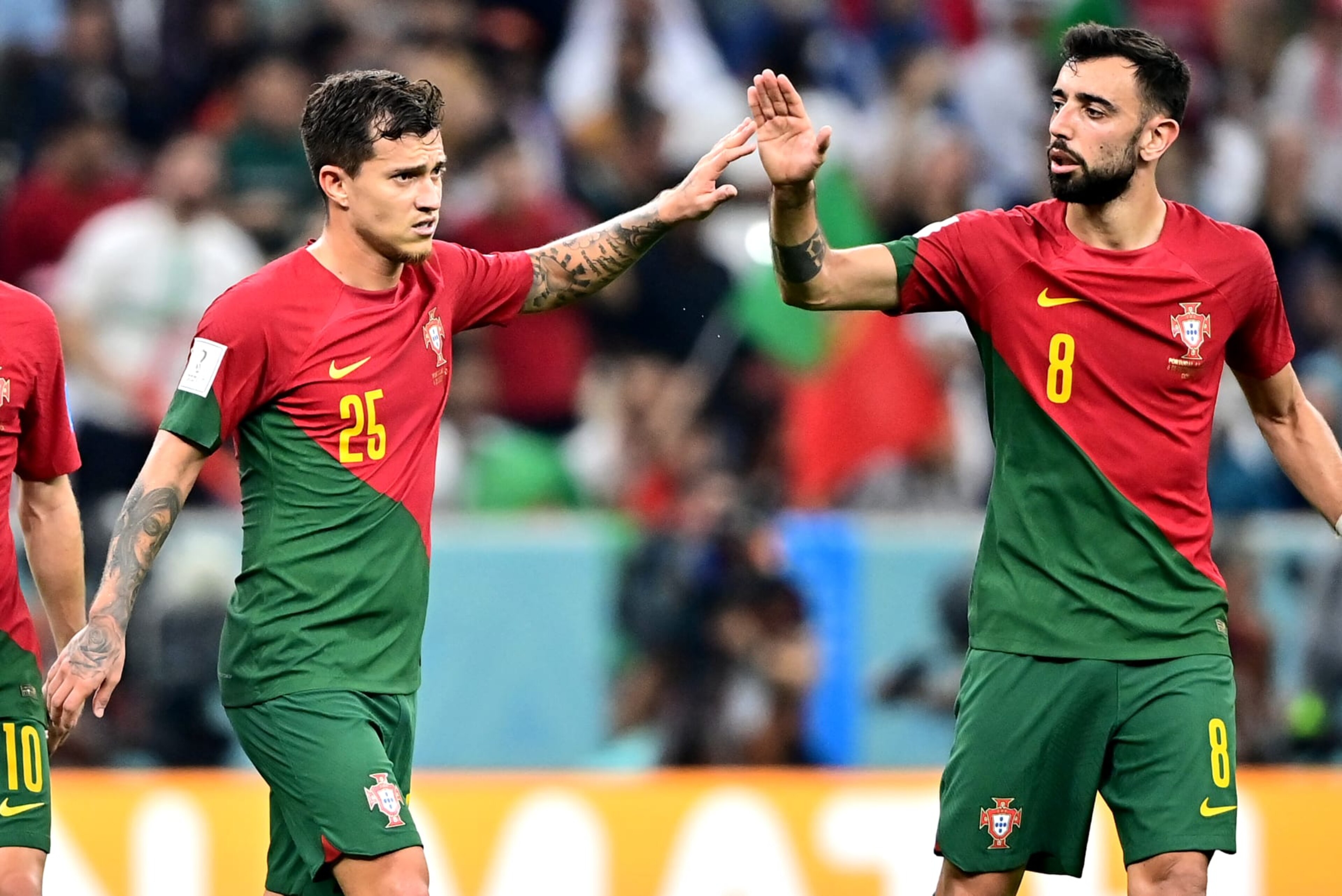 LLUSAIL CITY, QATAR - DECEMBER 06: Otavio and Bruno Fernandes of Portugal celebrates ,during the FIFA World Cup Qatar 2022 Round of 16 match between Portugal and Switzerland at Lusail Stadium on December 6, 2022 in Lusail City, Qatar. (Photo by MB Media/Getty Images) LLUSAIL CITY, QATAR - DECEMBER 06: Otavio and Bruno Fernandes of Portugal celebrates ,during the FIFA World Cup Qatar 2022 Round of 16 match between Portugal and Switzerland at Lusail Stadium on December 6, 2022 in Lusail City, Qatar. (Photo by MB Media/Getty Images)