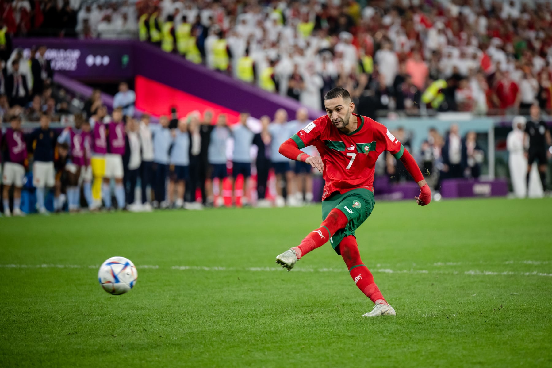 AL RAYYAN, QATAR - DECEMBER 06: Hakim Ziyech of Morocco scores a penalty during the FIFA World Cup Qatar 2022 Round of 16 match between Morocco and Spain at Education City Stadium on December 06, 2022 in Al Rayyan, Qatar. (Photo by Marvin Ibo Guengoer - GES Sportfoto/Getty Images)