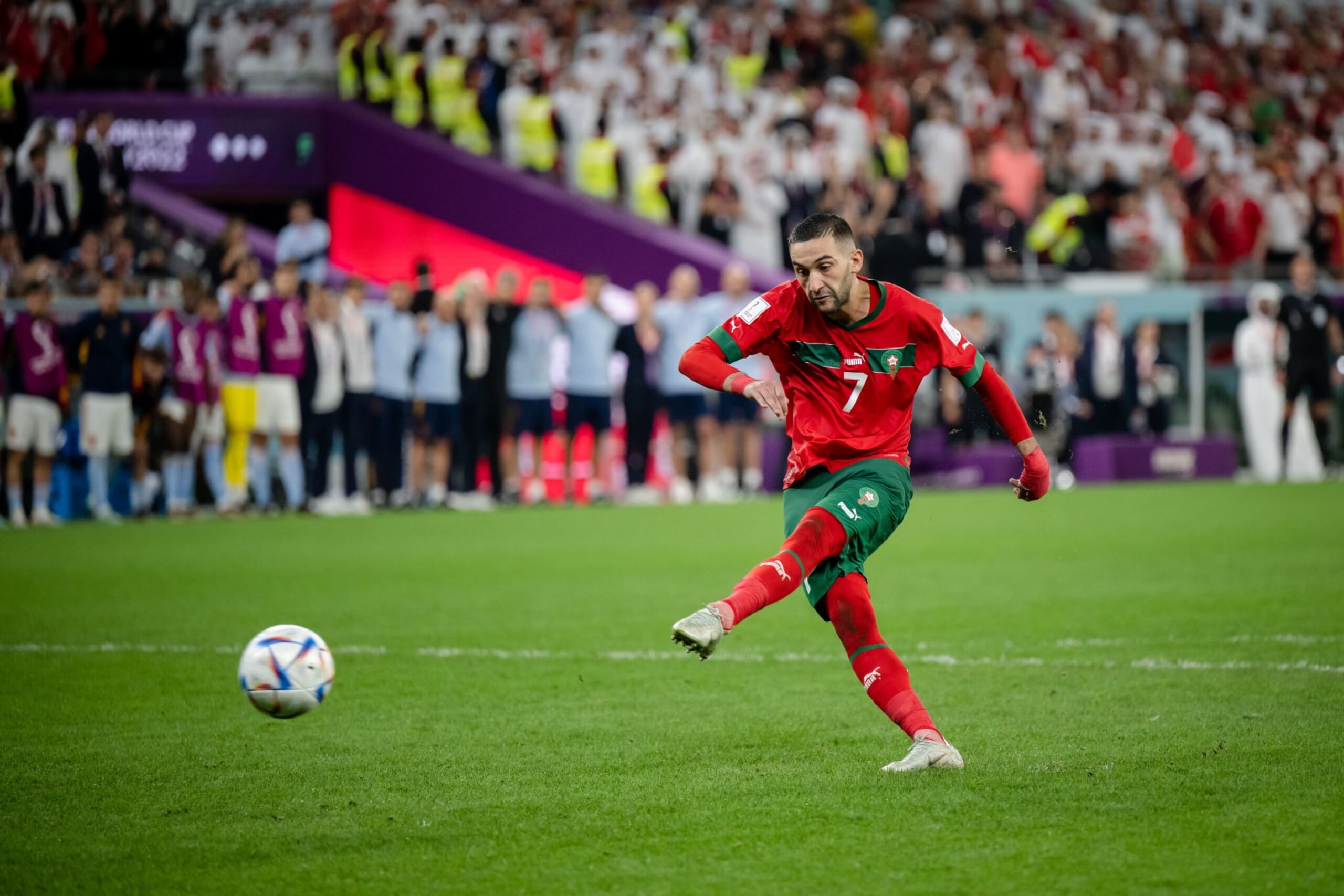 AL RAYYAN, QATAR - DECEMBER 06: Hakim Ziyech of Morocco scores a penalty during the FIFA World Cup Qatar 2022 Round of 16 match between Morocco and Spain at Education City Stadium on December 06, 2022 in Al Rayyan, Qatar. (Photo by Marvin Ibo Guengoer - GES Sportfoto/Getty Images)