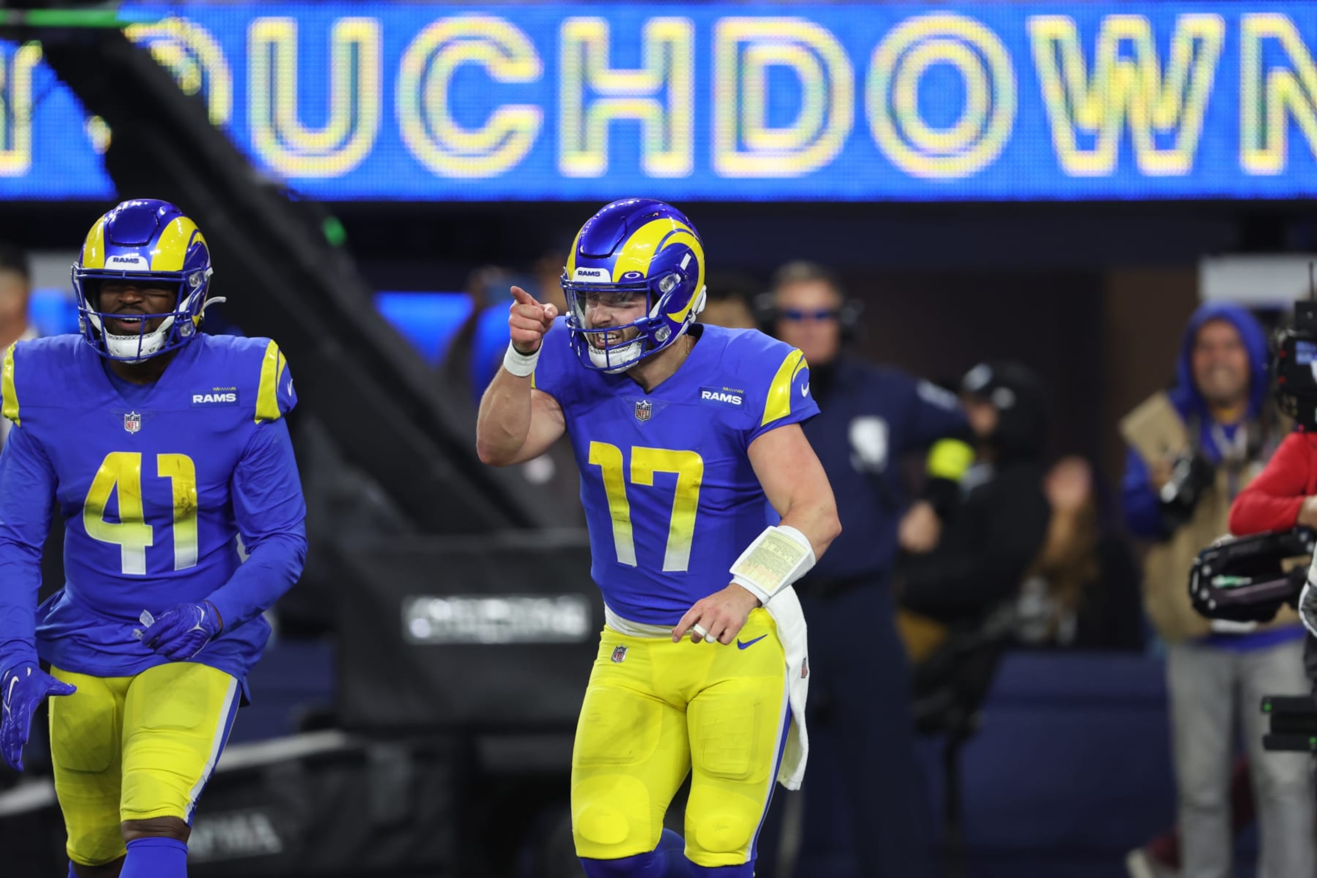 INGLEWOOD, CALIFORNIA - DECEMBER 08: Baker Mayfield #17 of the Los Angeles Rams celebrates after throwing the game winning touchdown against the Las Vegas Raiders during the fourth quarter at SoFi Stadium on December 08, 2022 in Inglewood, California. (Photo by Sean M. Haffey/Getty Images)