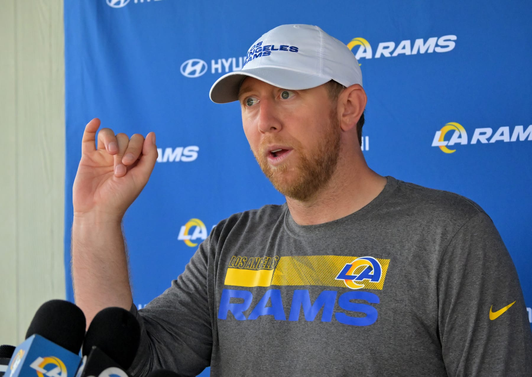 THOUSAND OAKS, CA - JUNE 8: Offensive coordinator Liam Coen of the Los Angeles Rams answers questions from the media following mini camp on June 8, 2022 at the team's facility at California Lutheran University in Thousand Oaks, California. (Photo by Jayne Kamin-Oncea/Getty Images)
