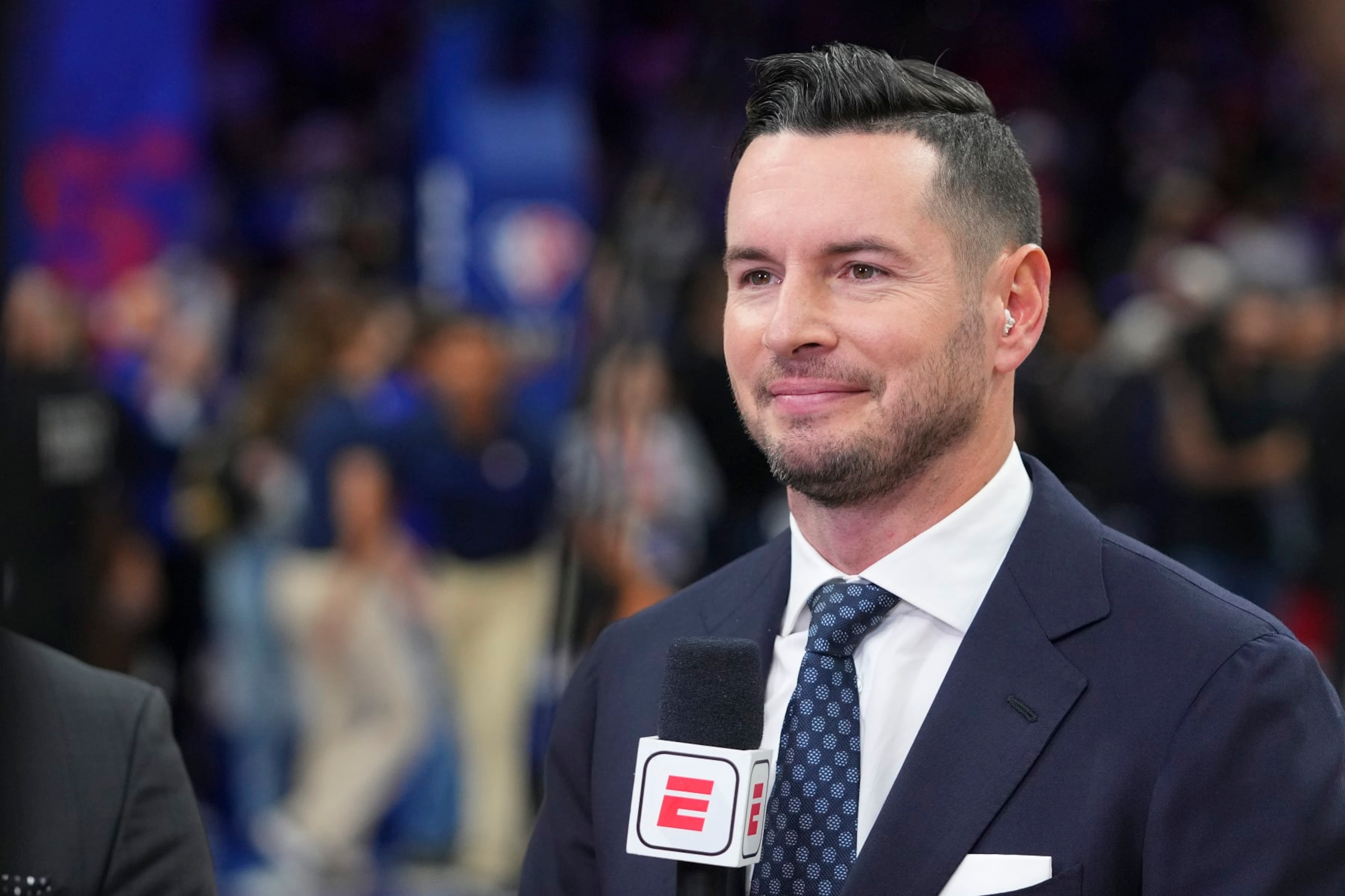 PHILADELPHIA, PA - MARCH 02: ESPN analyst JJ Redick looks on prior to the game between the New York Knicks and Philadelphia 76ers at the Wells Fargo Center on March 2, 2022 in Philadelphia, Pennsylvania. NOTE TO USER: User expressly acknowledges and agrees that, by downloading and or using this photograph, User is consenting to the terms and conditions of the Getty Images License Agreement. (Photo by Mitchell Leff/Getty Images)