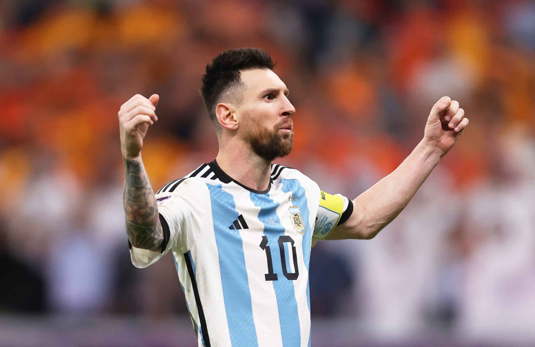 LUSAIL CITY, QATAR - DECEMBER 09: Lionel Messi of Argentina celebrates scoring the team's first penalty in the penalty shoot out during the FIFA World Cup Qatar 2022 quarter final match between Netherlands and Argentina at Lusail Stadium on December 09, 2022 in Lusail City, Qatar. (Photo by Julian Finney/Getty Images)